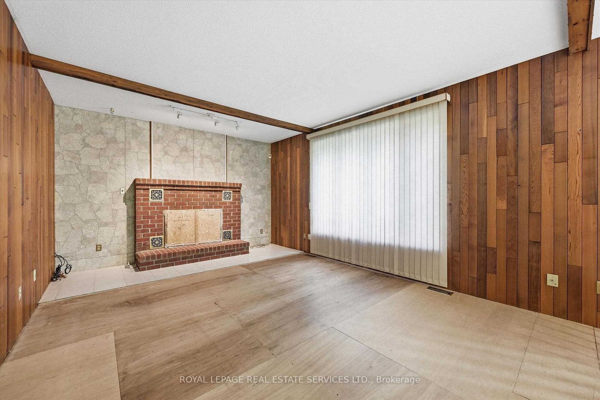 Sunken Family Room with a Woodburning Fireplace