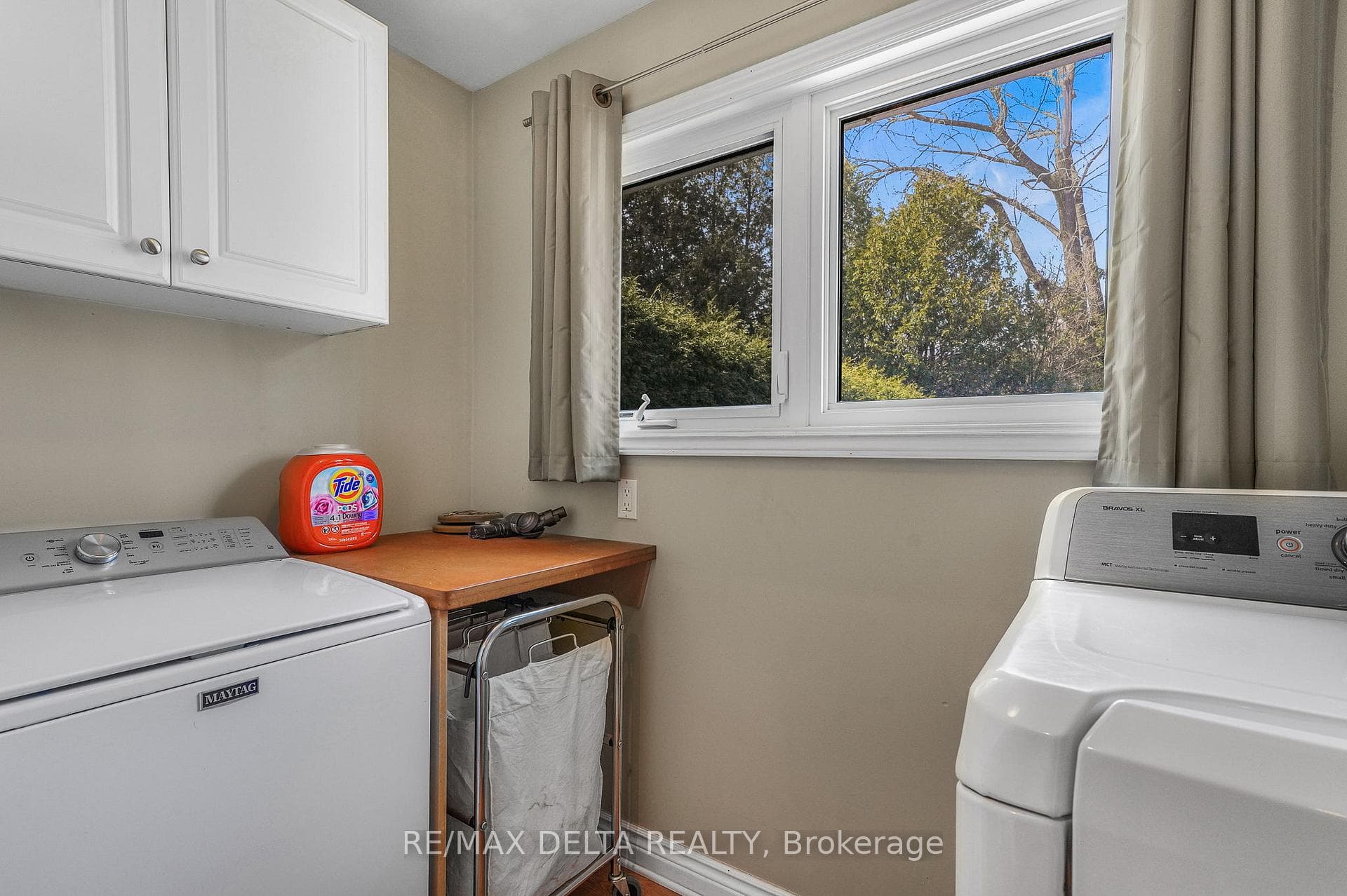 Off the bathroom...handy main floor laundry room.