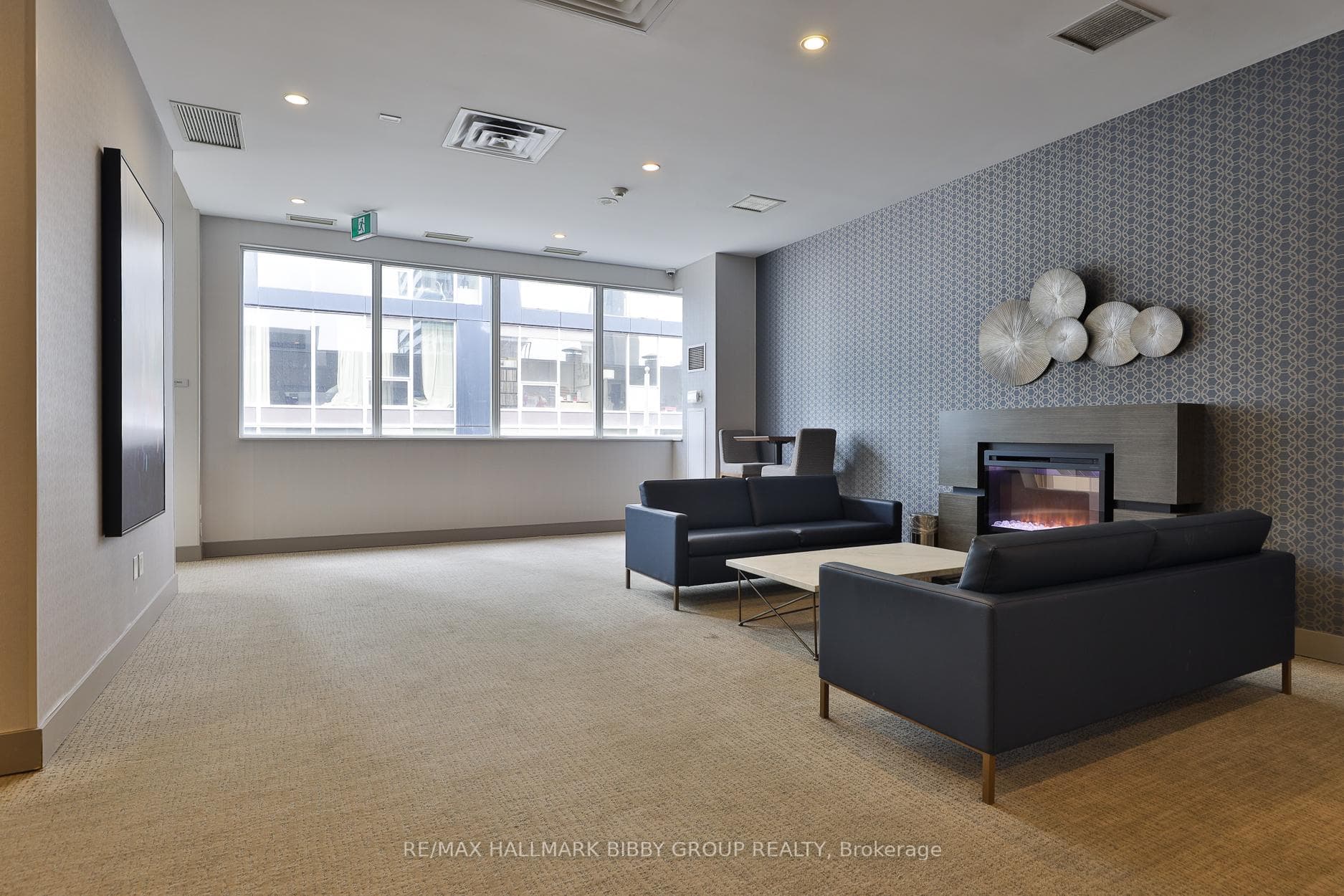 Upper lounge with fireplace