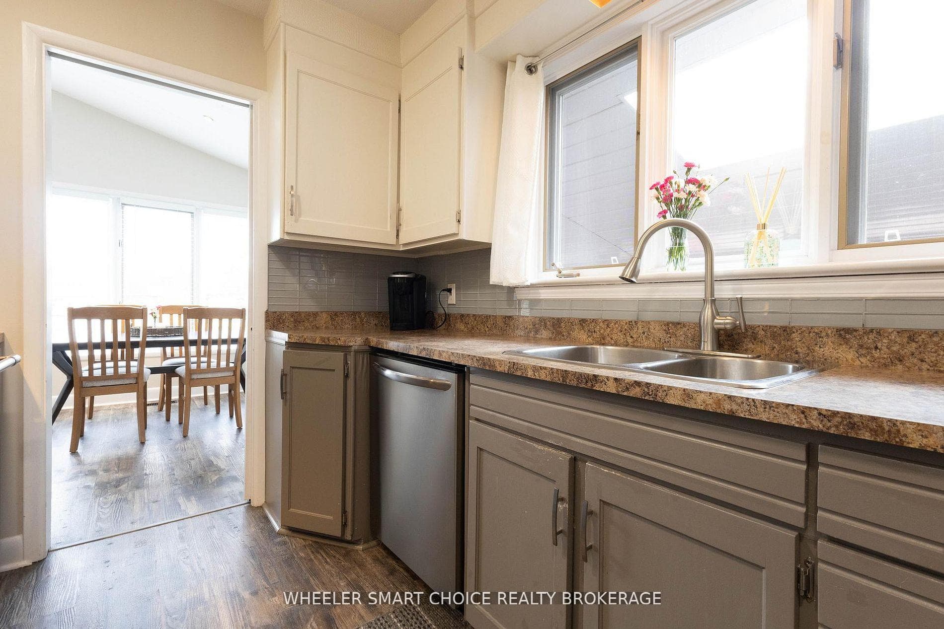 The formal dining room beyond the kitchen
