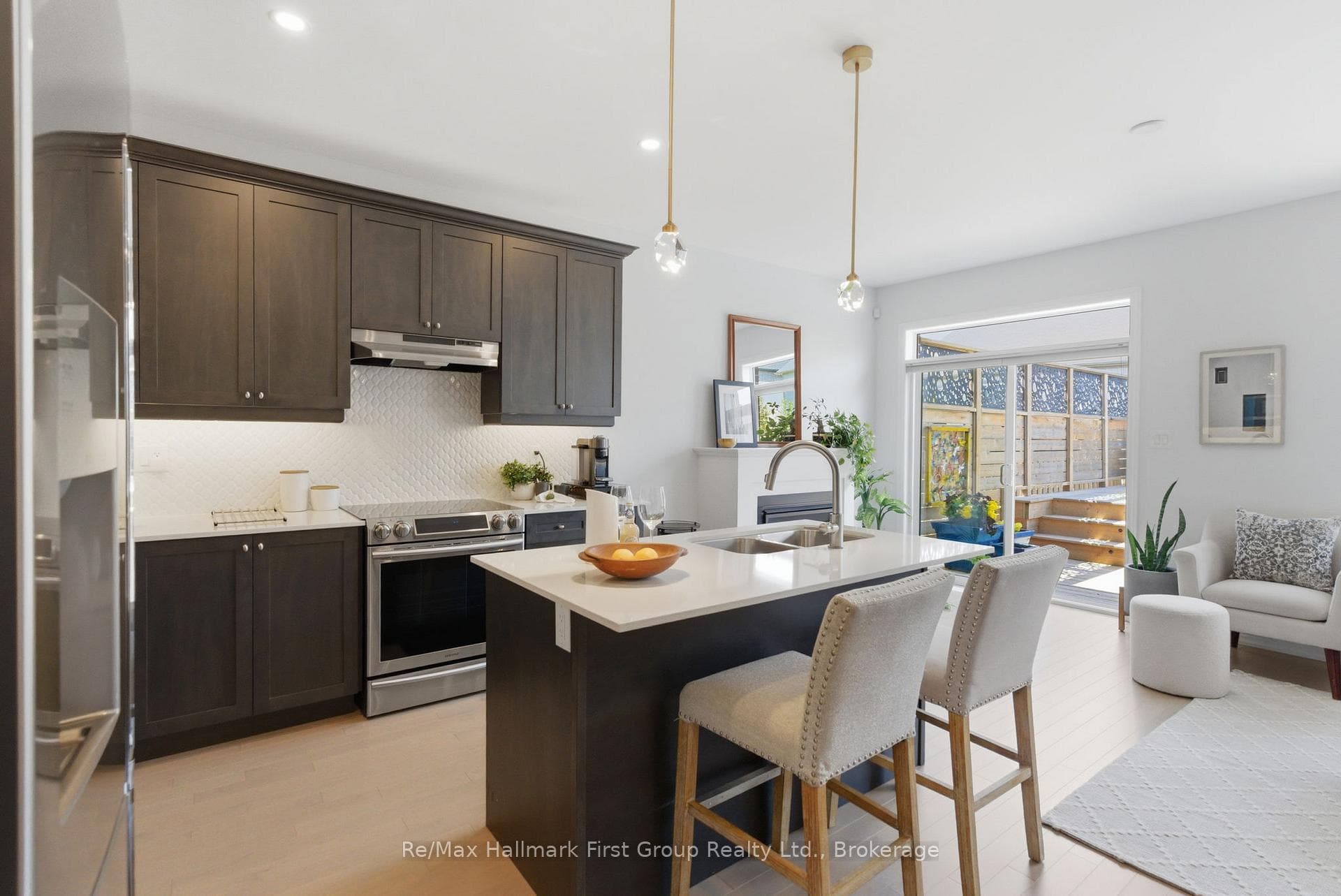 Cozy gas fireplace off Kitchen