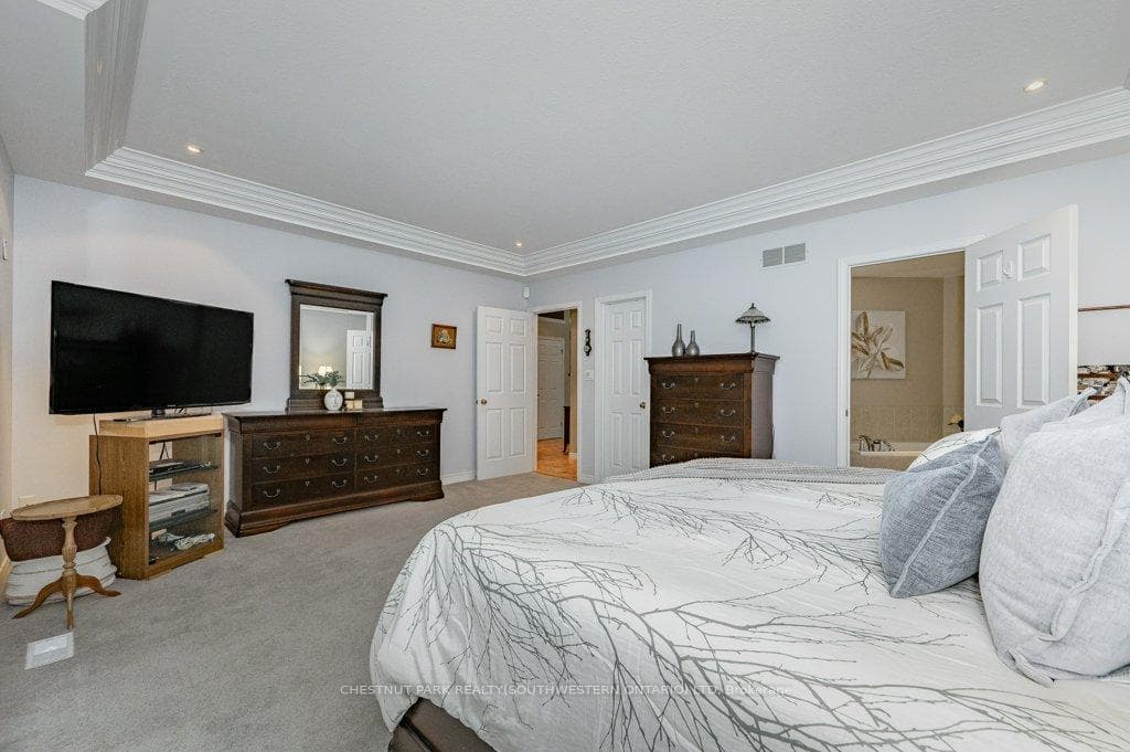 Primary suite with large walk-in closet & ensuite