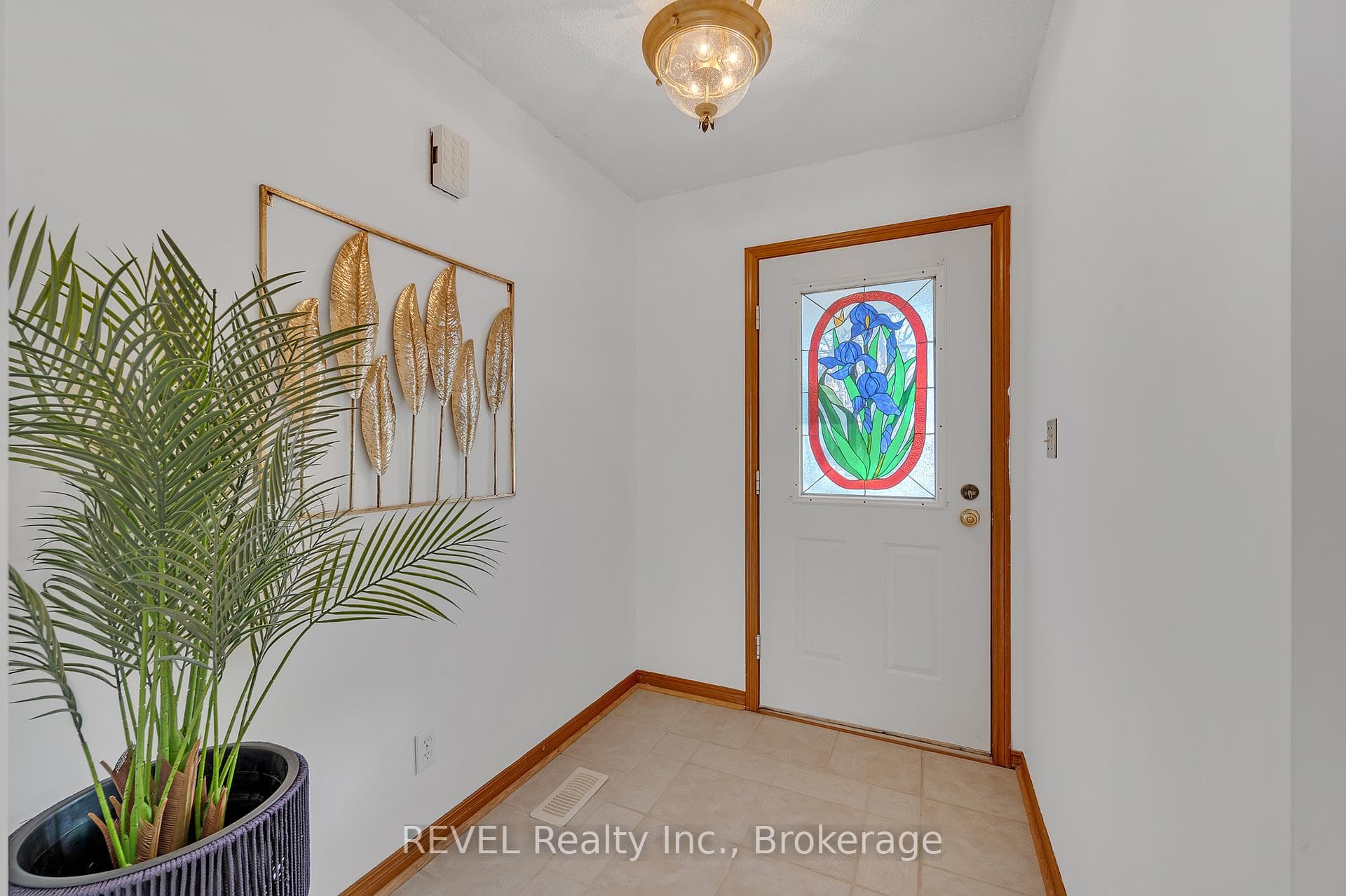 Front door with stained glass accent