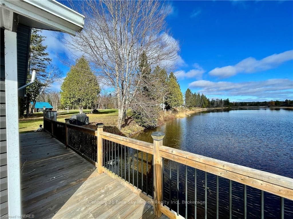 Deck area featuring a water view