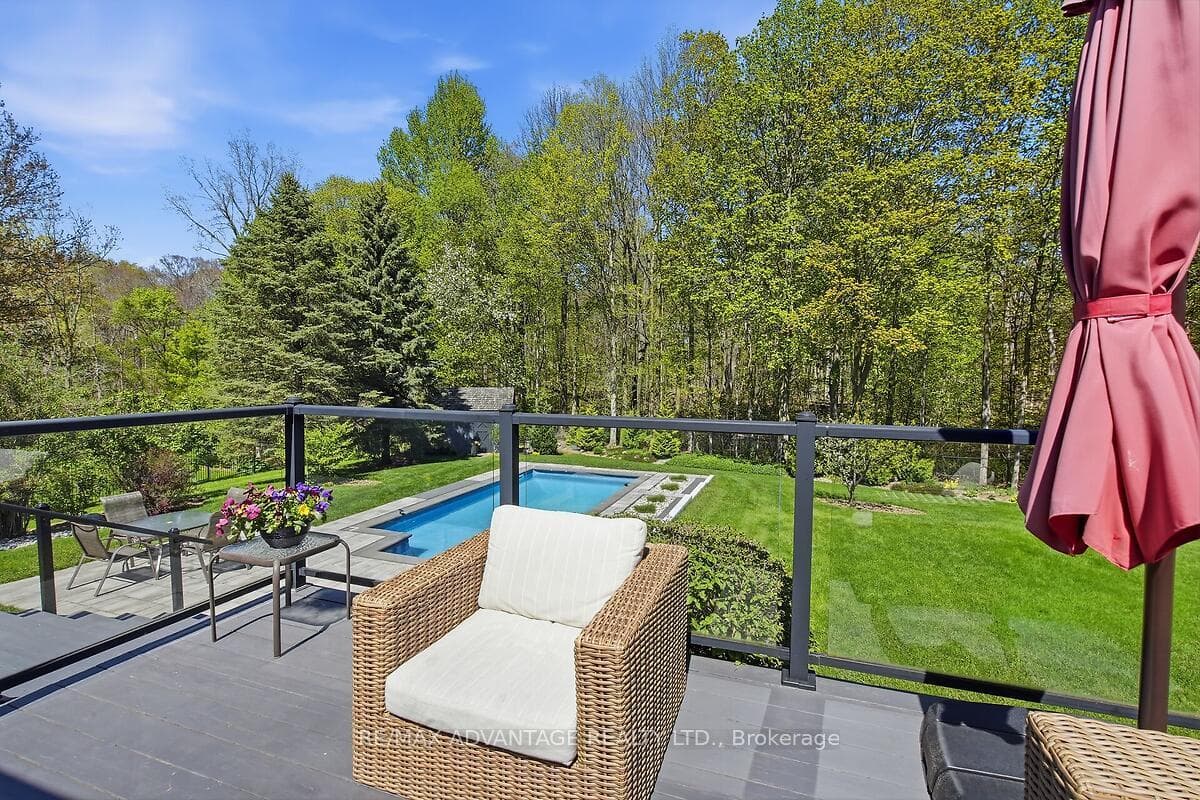 patio overlooking inground pool