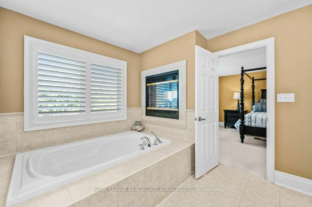 5-Piece Primary Ensuite with a Relaxing Soaker Tub