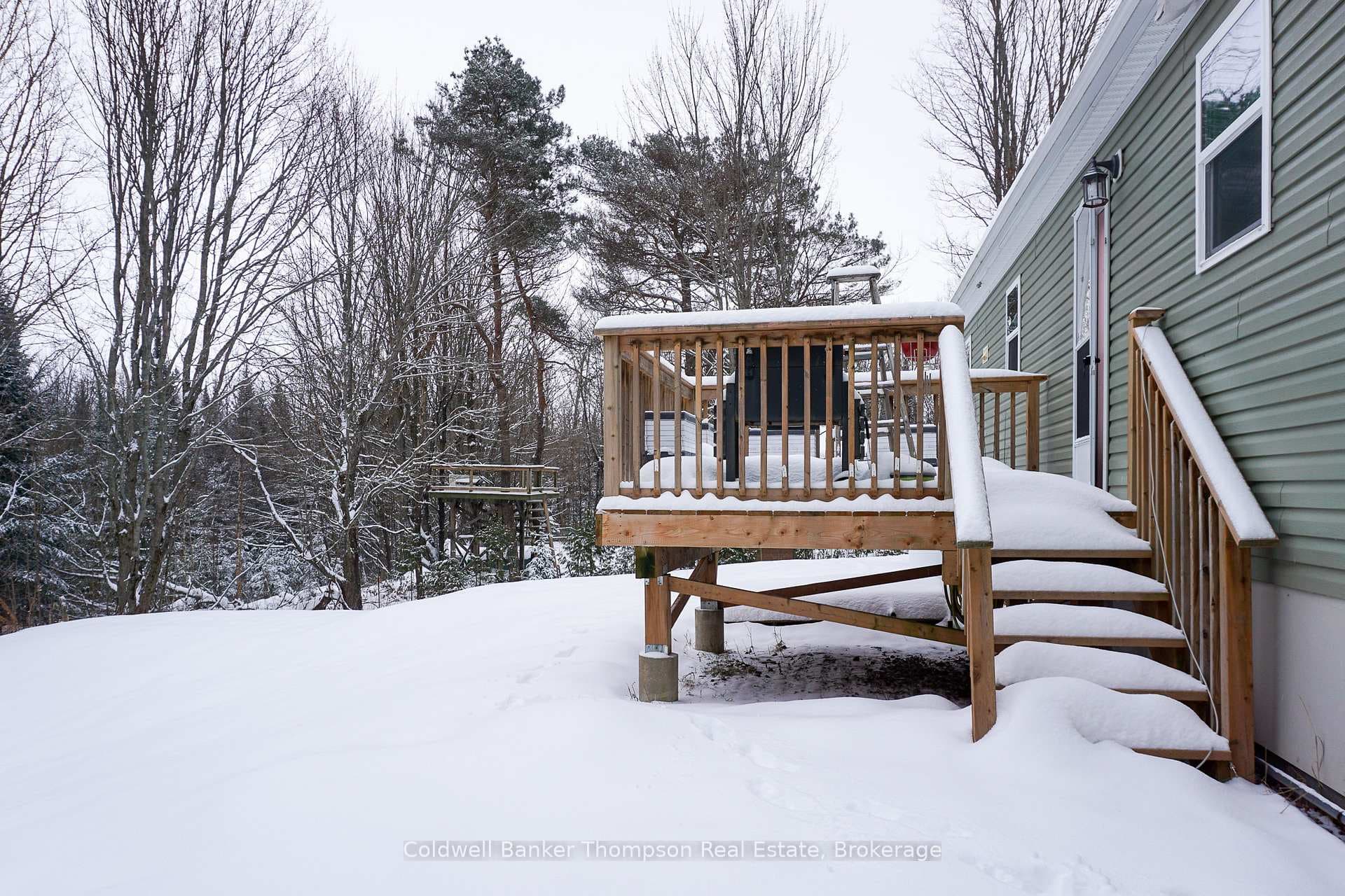 Back Deck Entrance off of Mechanical/Kitchen.