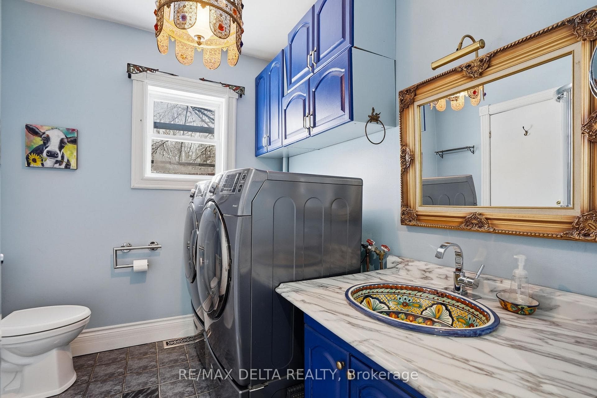 Laundry room, bath with shower, off kitchen.