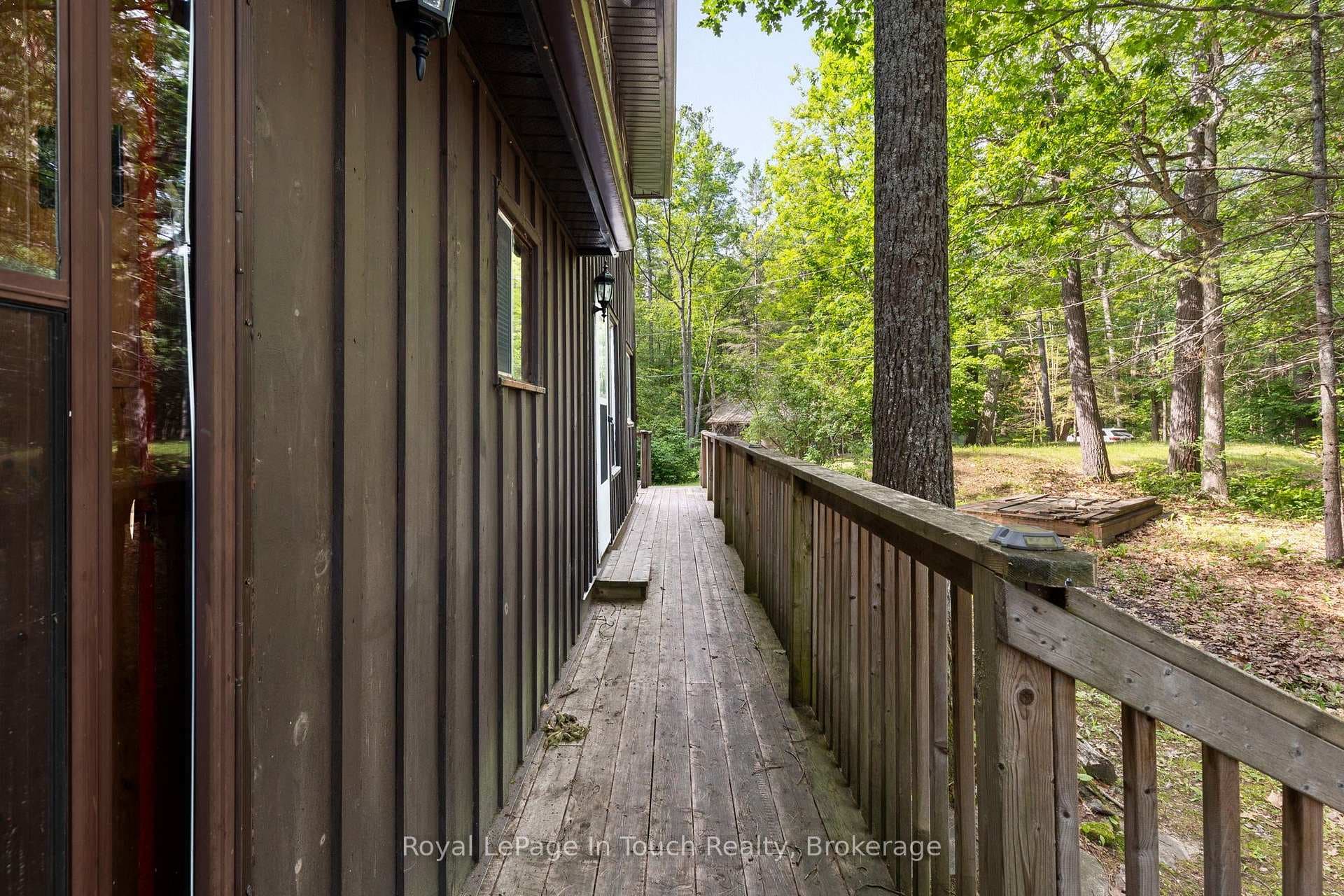 Deck off The back entrance into The Cottage