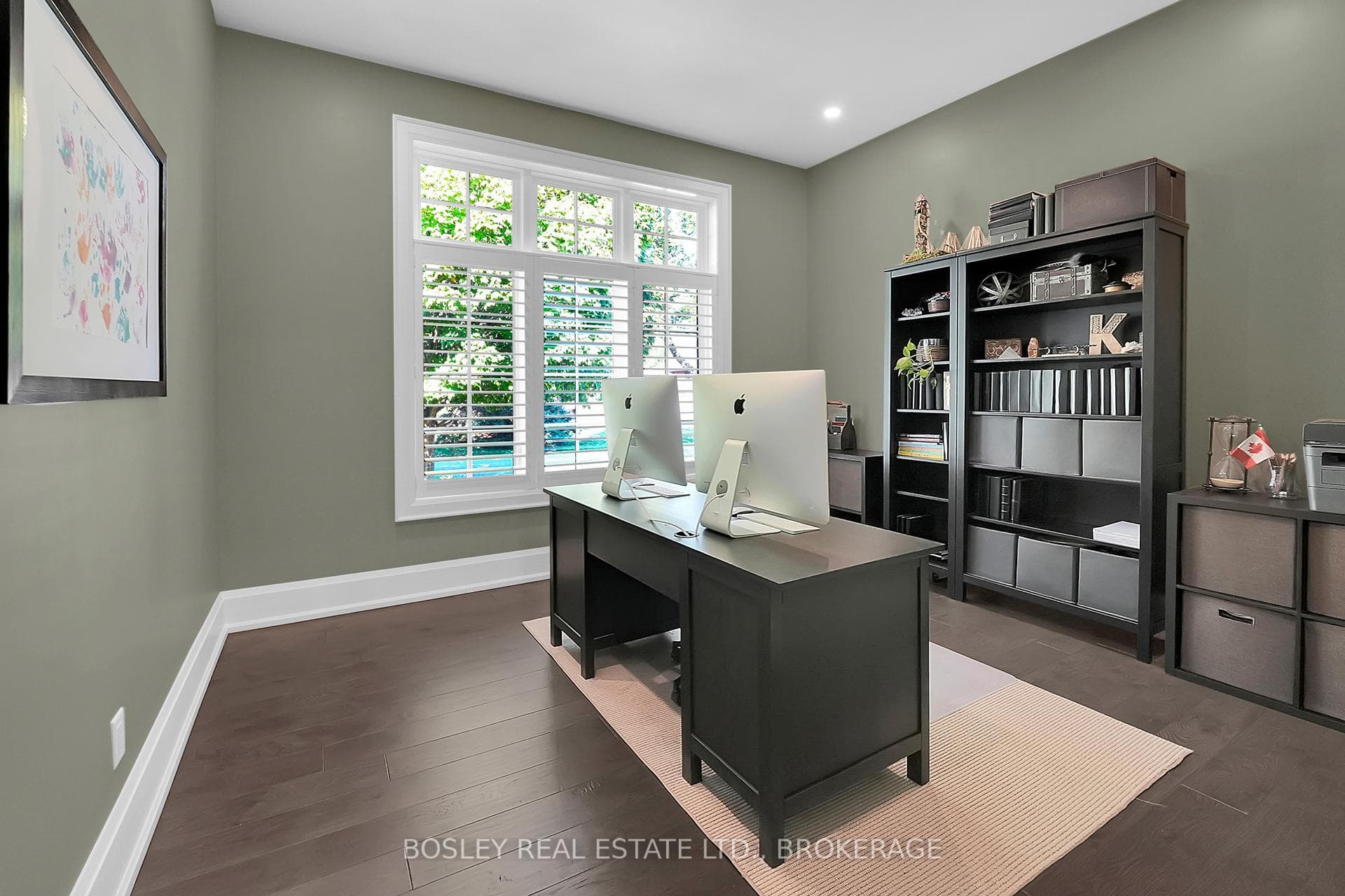 the front of the home is the den / office which is