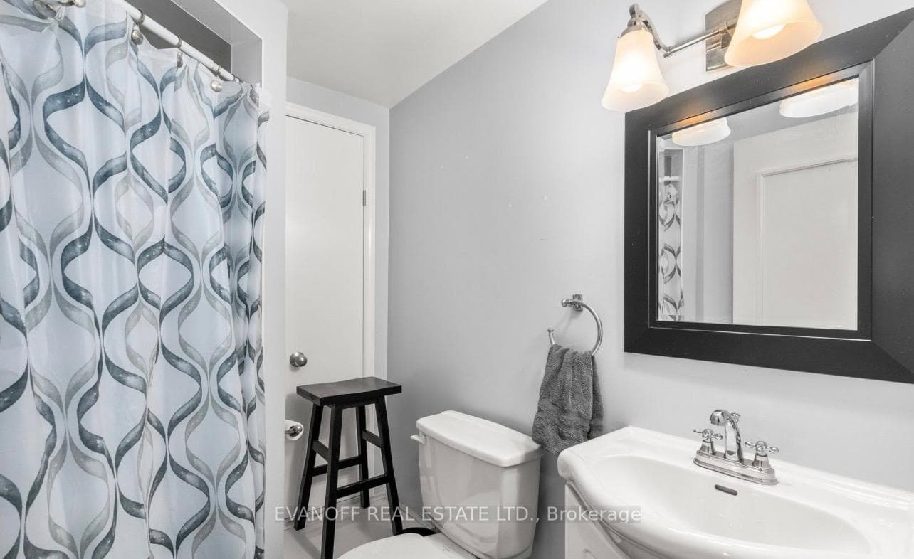stand up shower, toilet, sink. Lower Level