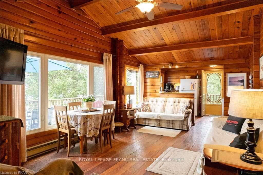 Living room with Kitchen in the background