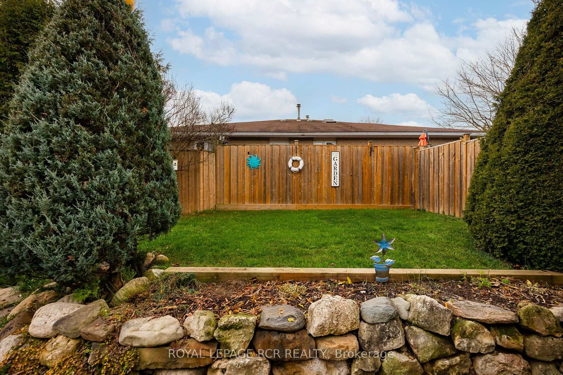 The fenced-in yard offers privacy.