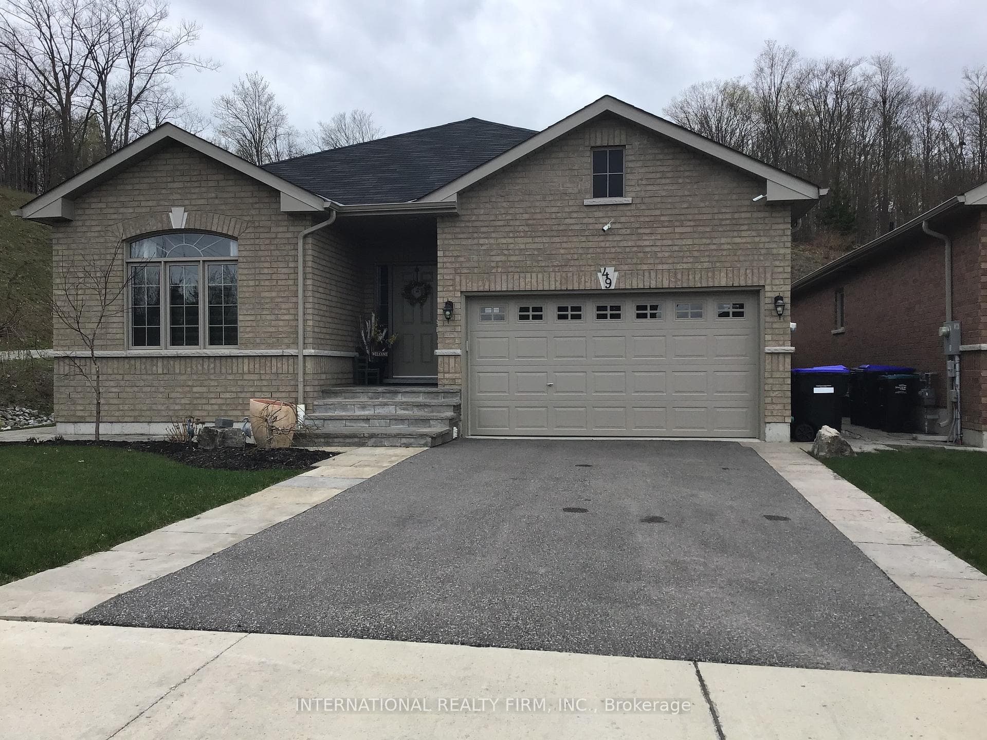 HOUSE AND DRIVEWAY