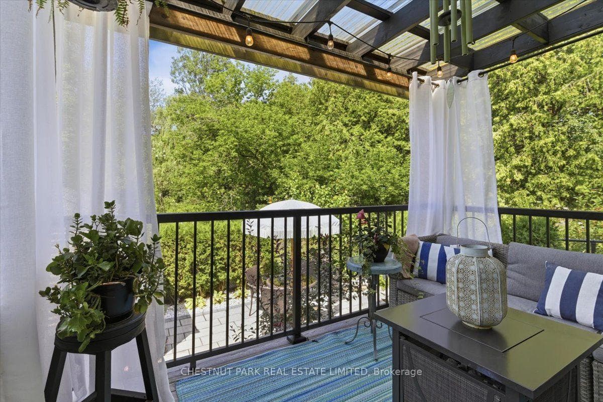 Screened-in Outdoor Living Room with Serene Views