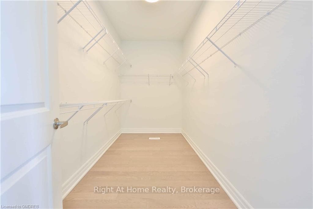 Primary Bedroom Walk in Closet