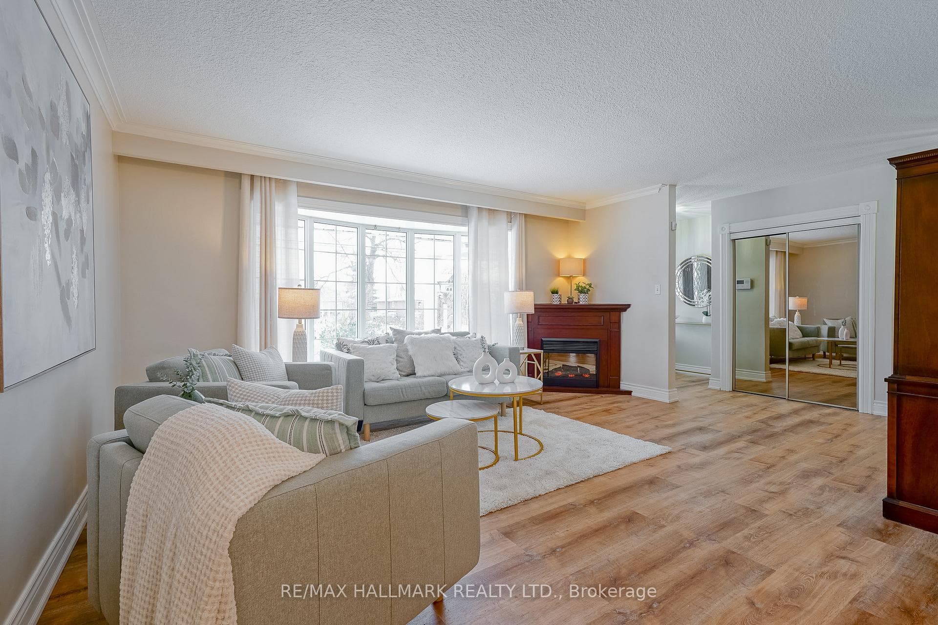 Bright Open Living Room with Electric FP