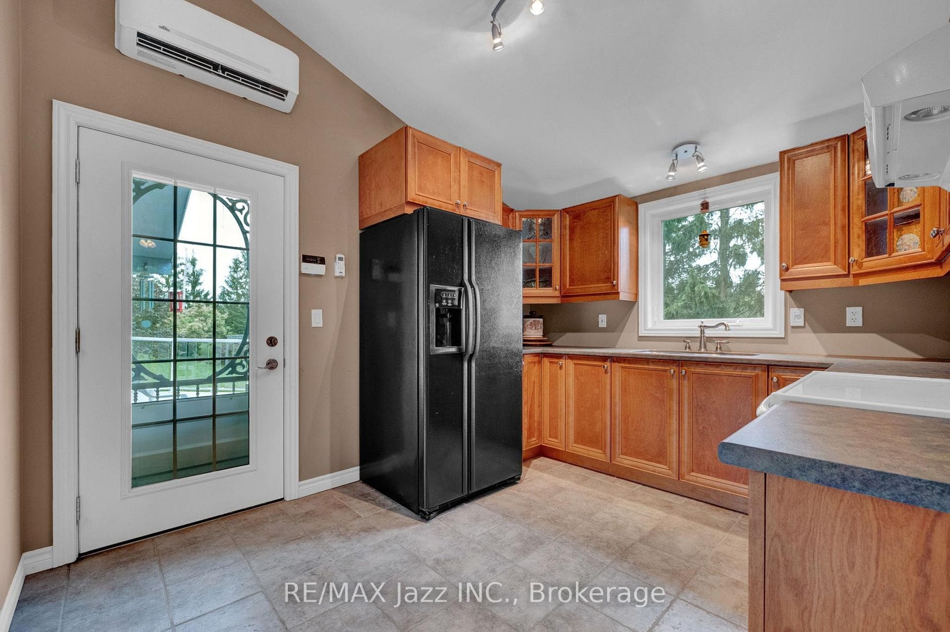 In-law suite kitchen with access to balcony