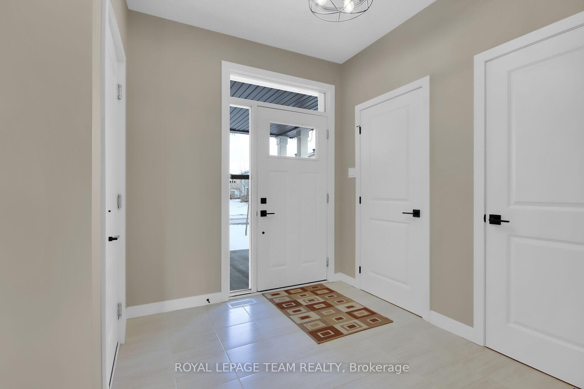 Spacious ceramic tiled front foyer
