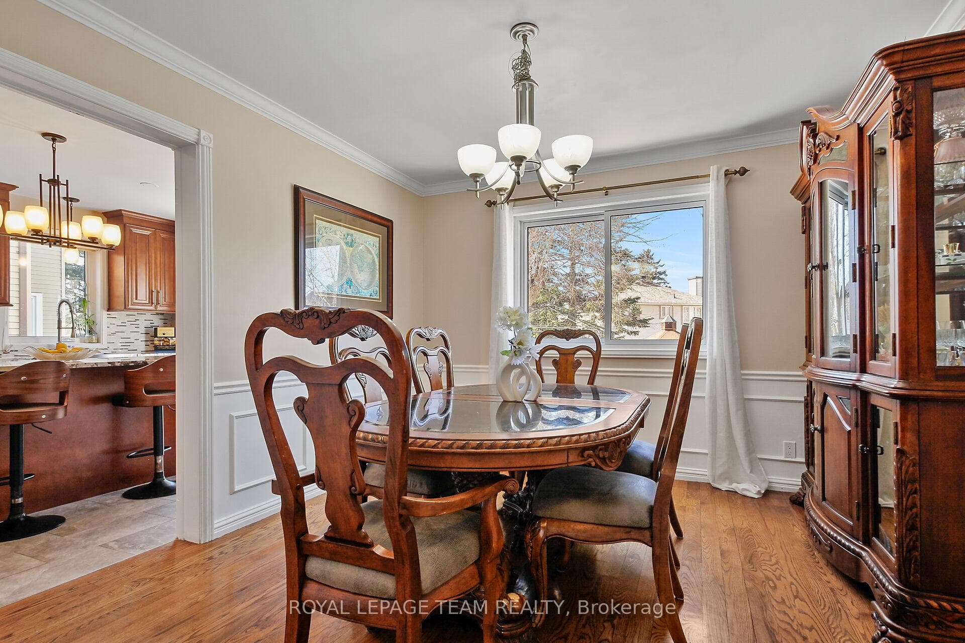 Elegant & formal diningroom w/wall trim decor