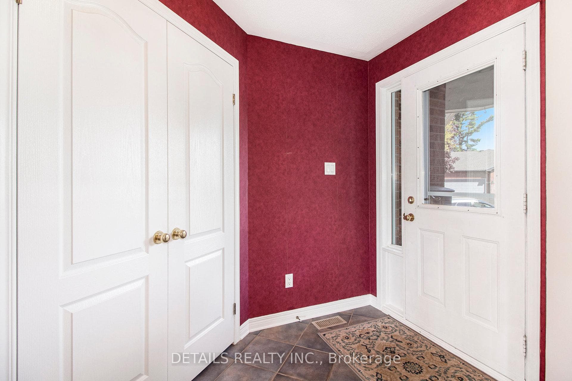 Spacious foyer with large closet.
