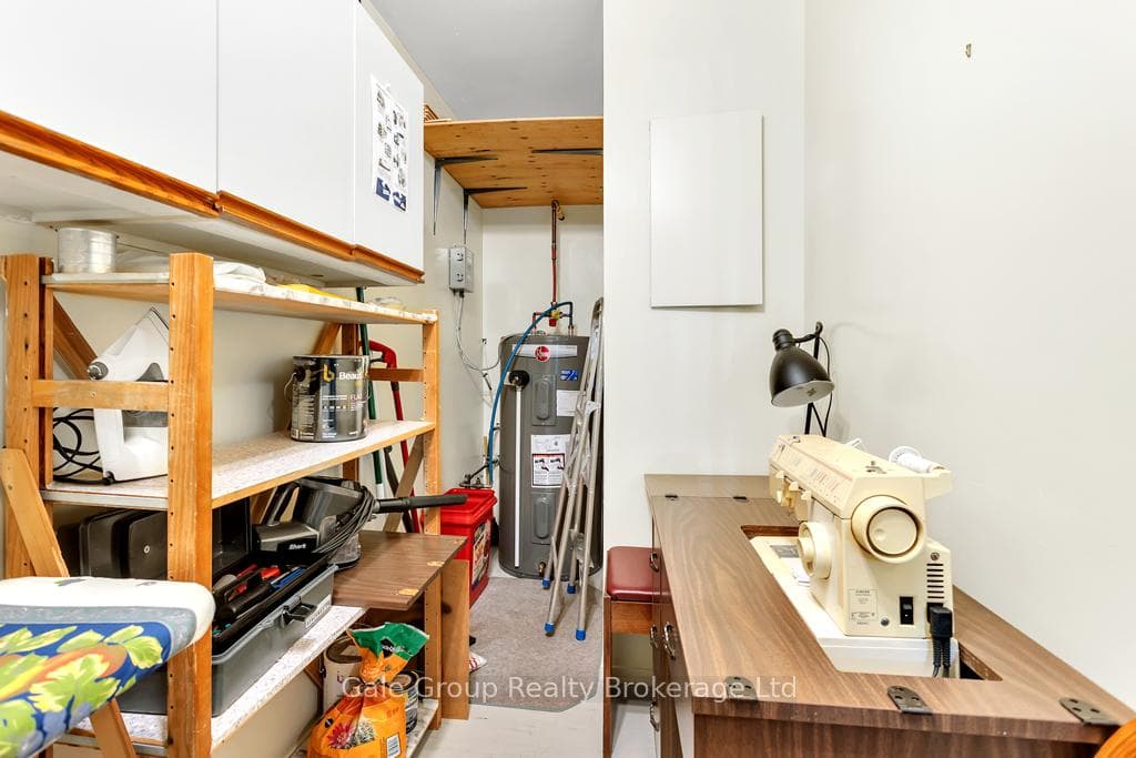 Otherside of laundry room with storage shelves