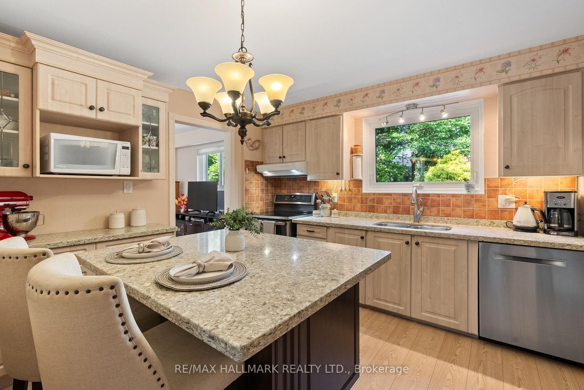 Updated Kitchen with Centre Island Quartz counters