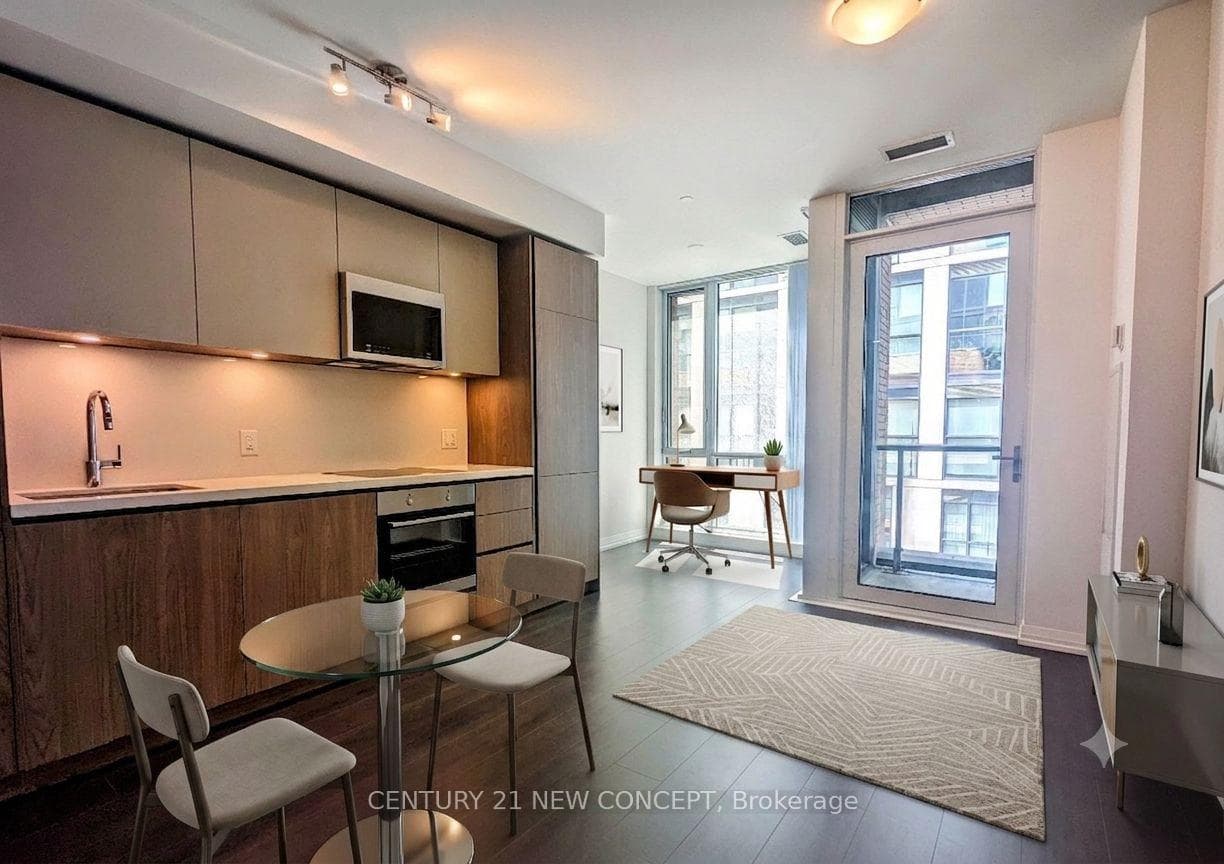 VIRTUALLY STAGED - LIVING ROOM/KITCHEN/DEN