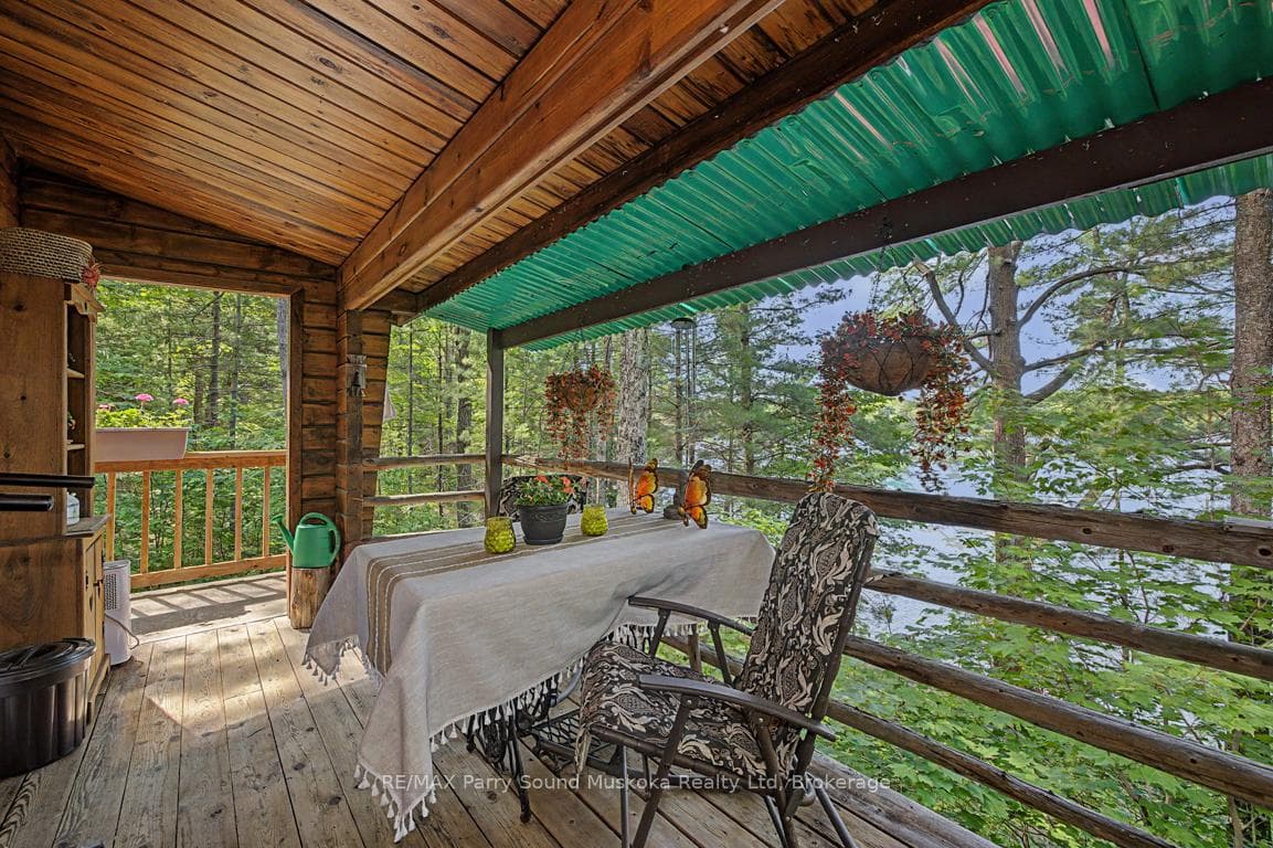 Fabulous Covered Porch Overlooks Lake