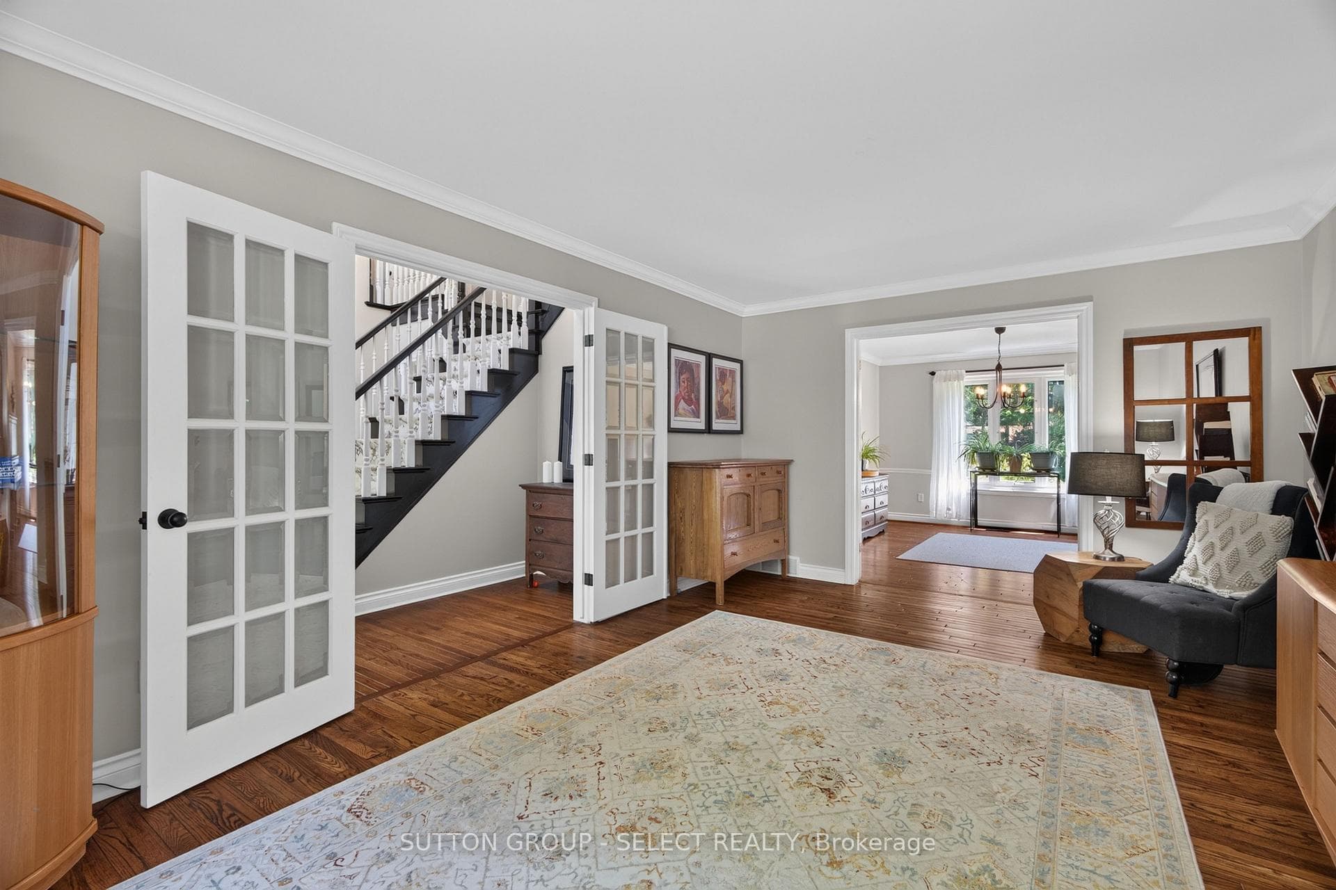 Living room with Hardwood floor & French Doors