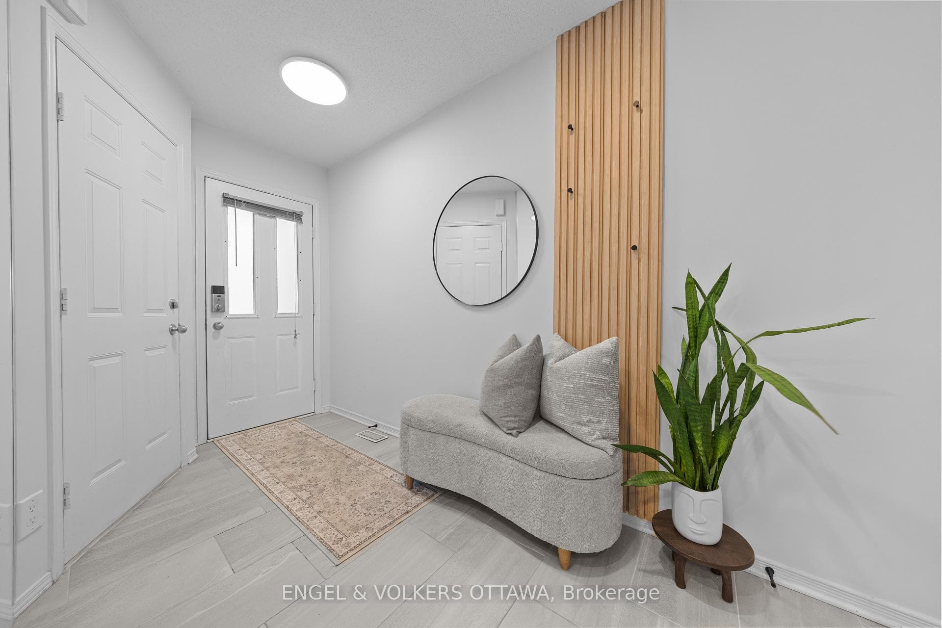 Spacious entryway with garage access and closet