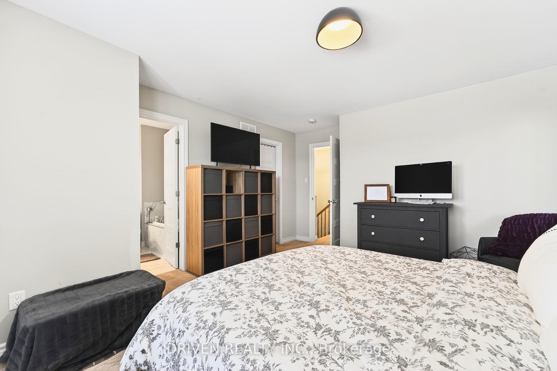 Primary bedroom features a walk-in closet.
