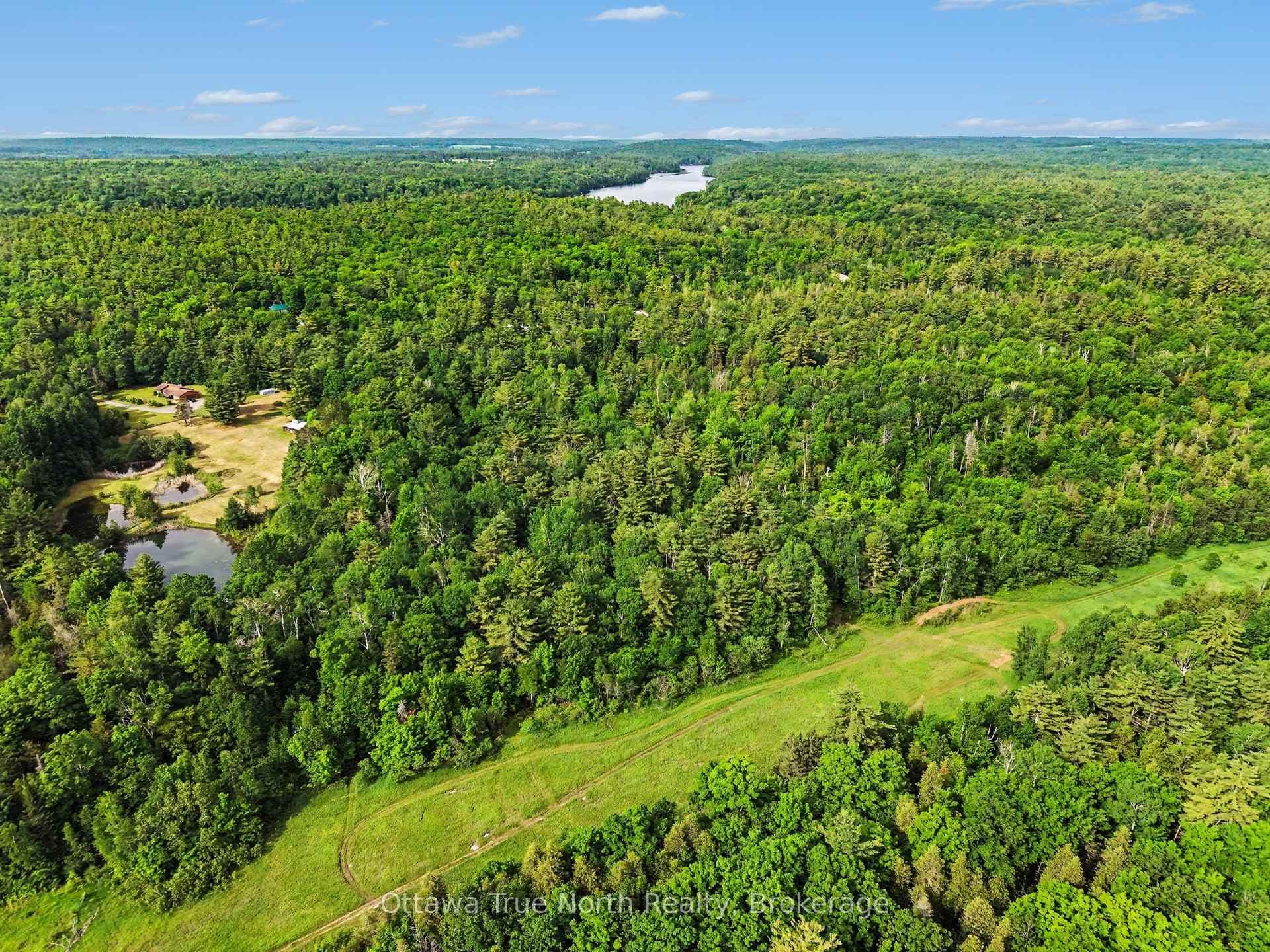 Snowmobile Trail at very back of 5 acre property