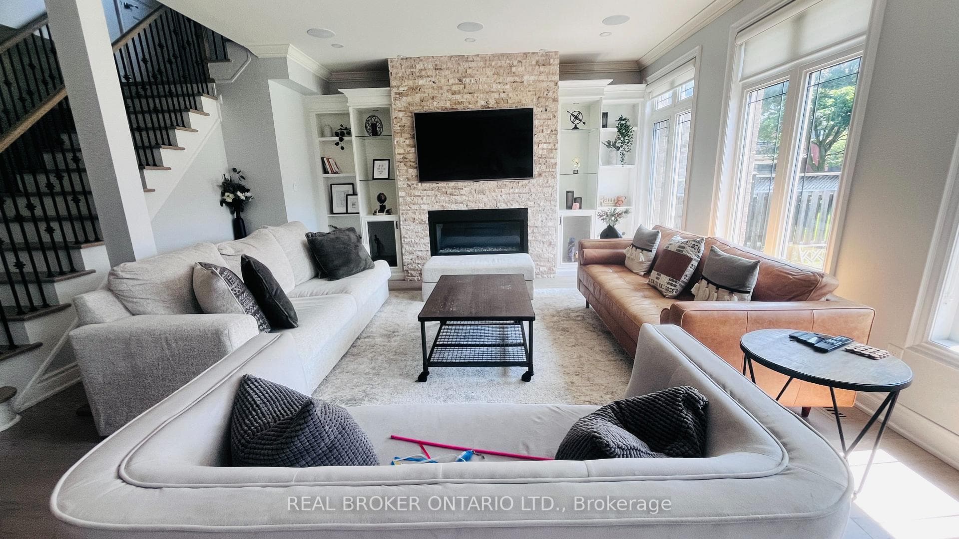 Family Room with stone feature. wall