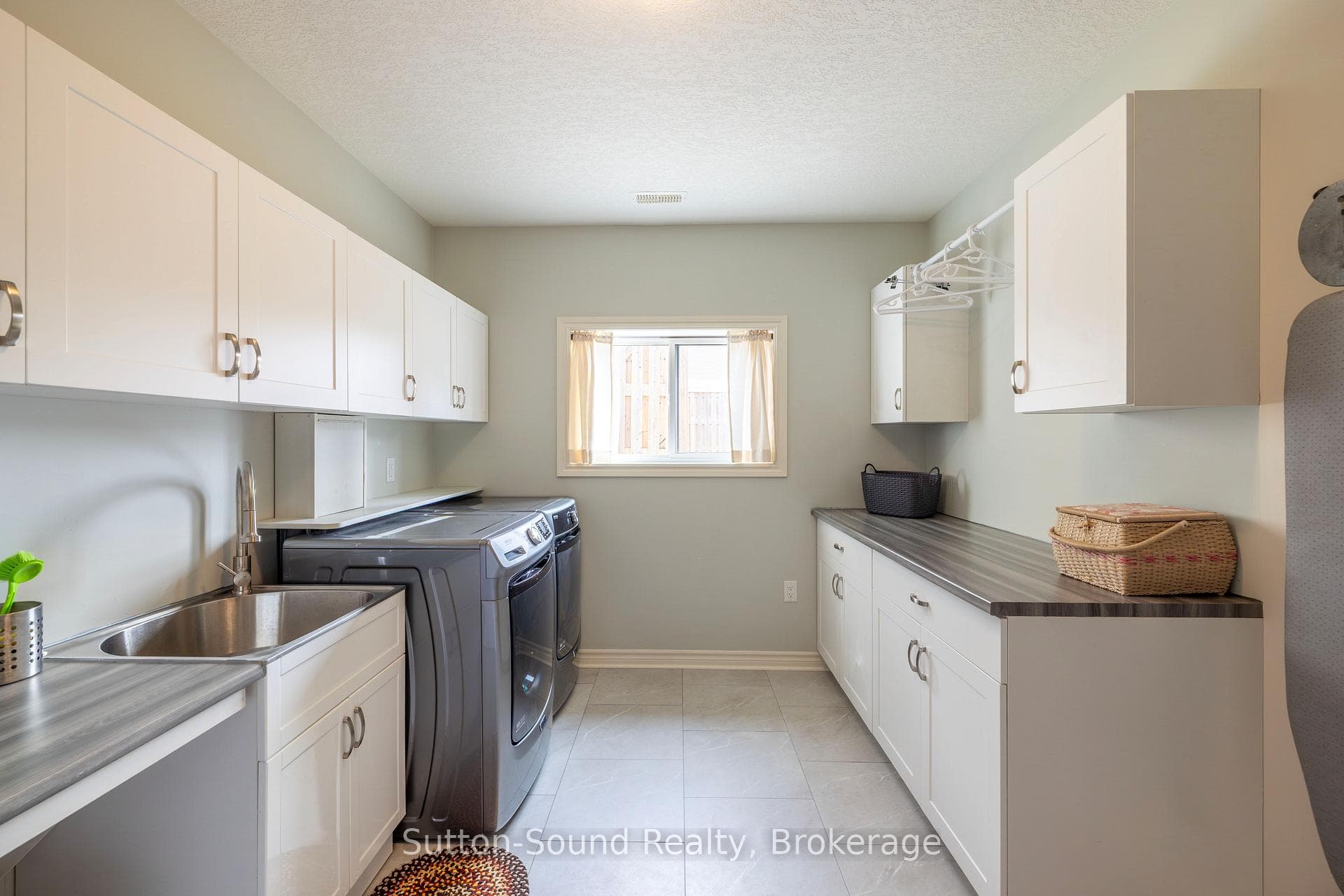 Laundry Sink and an Abundance of Cabinetry