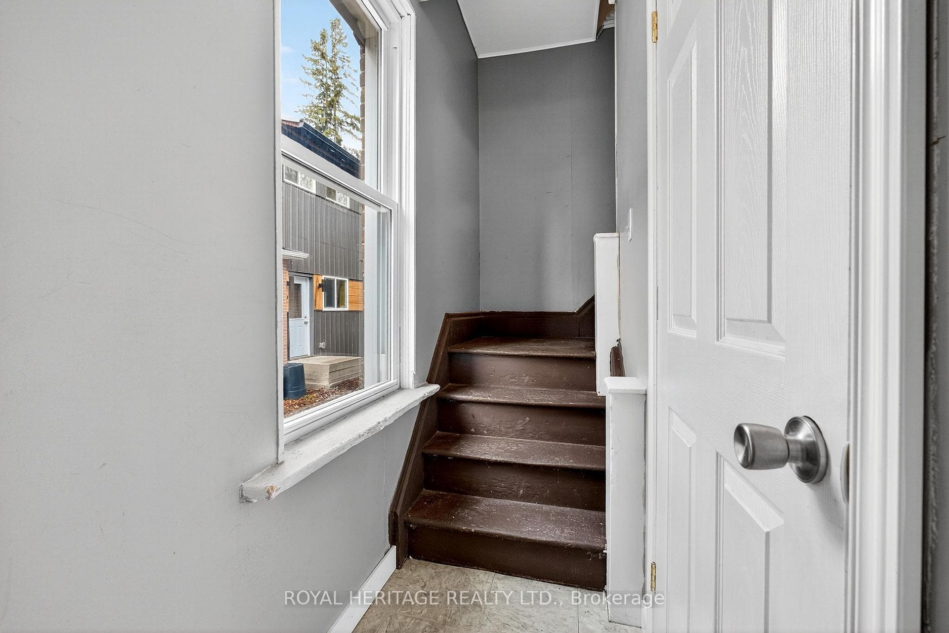Entrance to upper unit thru main floor