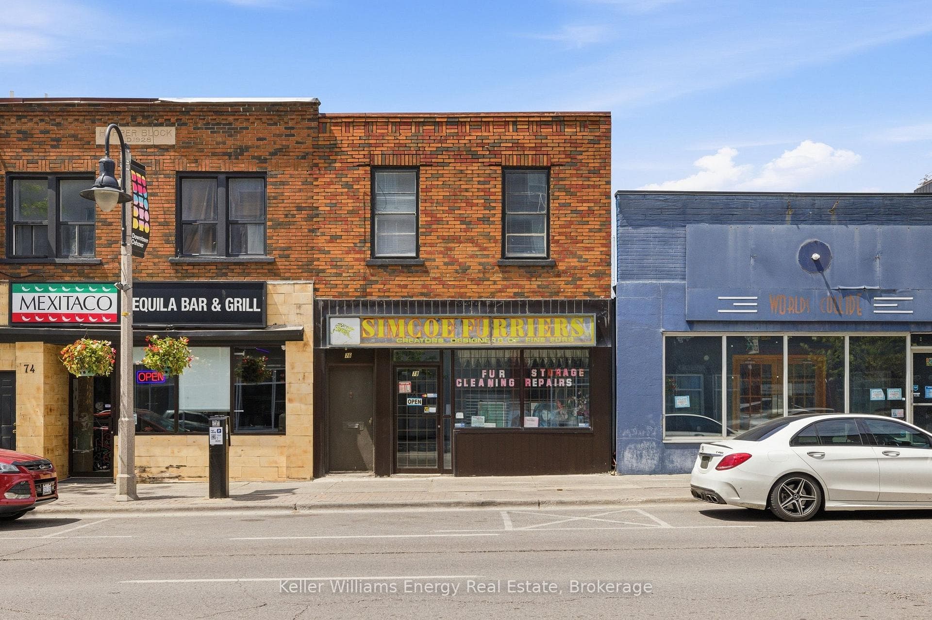 Retail Space with 3 Bachelor Apartments Above