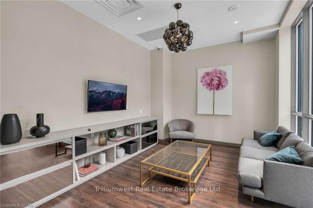 Living room with wood-type flooring
