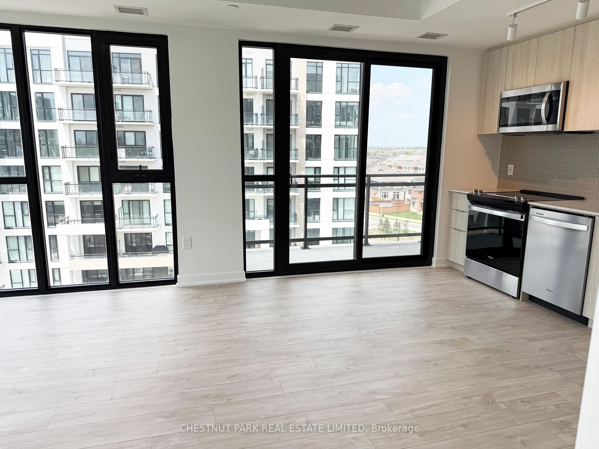 View of living & dining area from primary bedroom