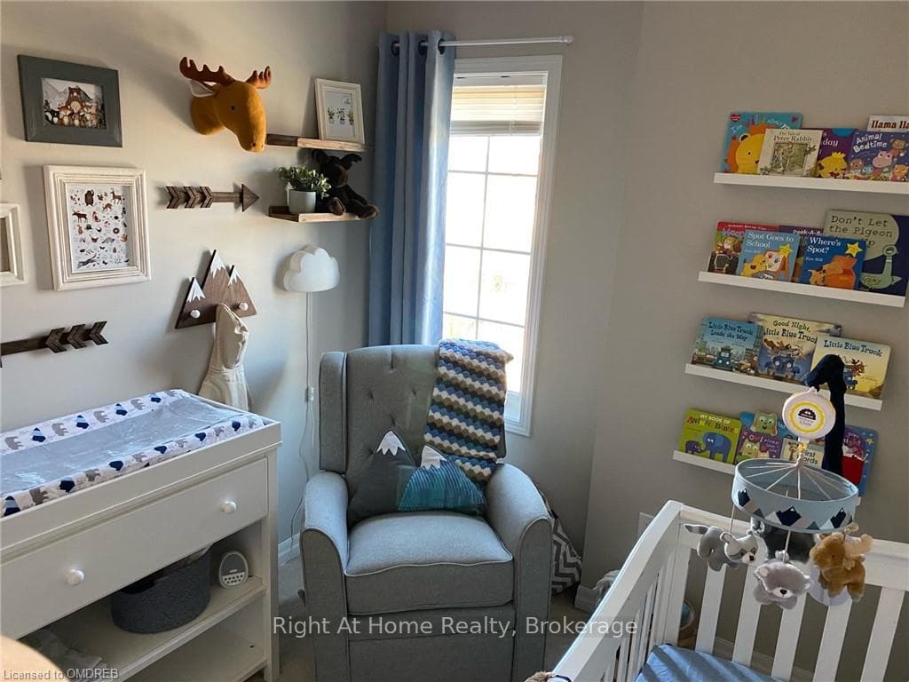 Bedroom with a nursery area
