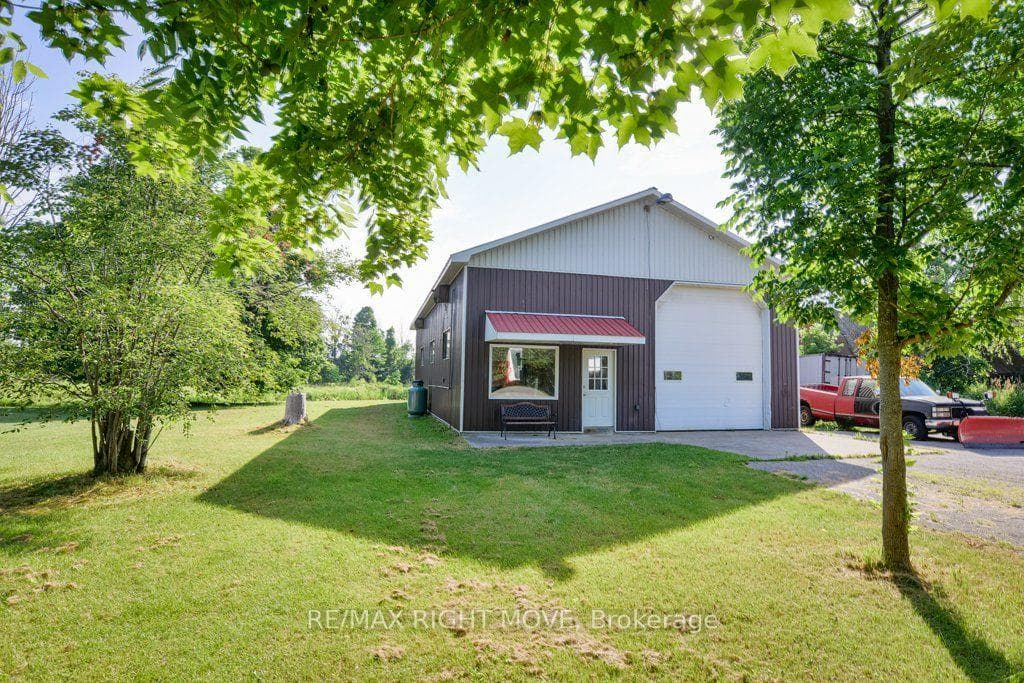 Detached shop 32ft. x 64ft.; 12 ft. overhead door.