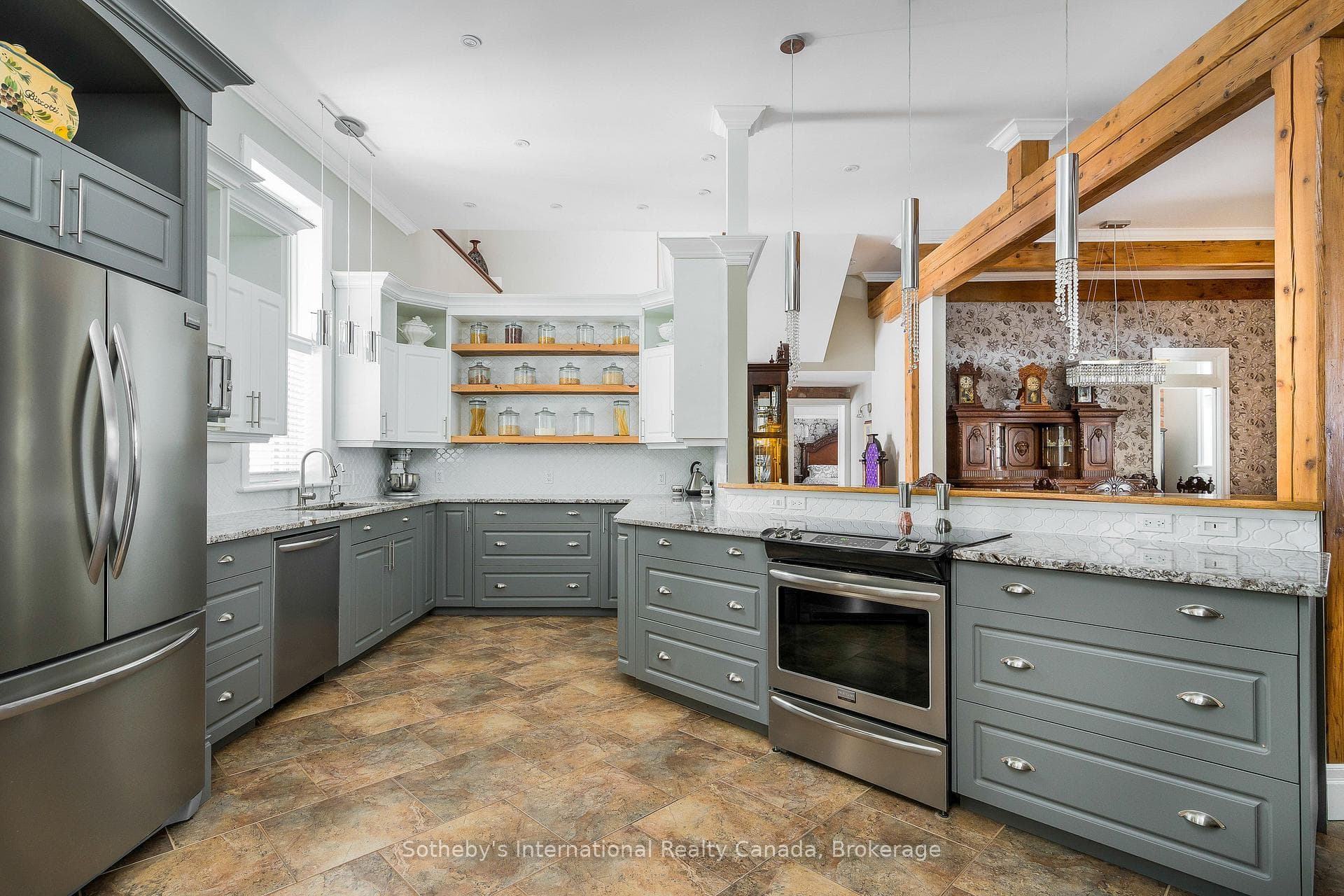 Bright Kitchen With Stainless Steel Appliances