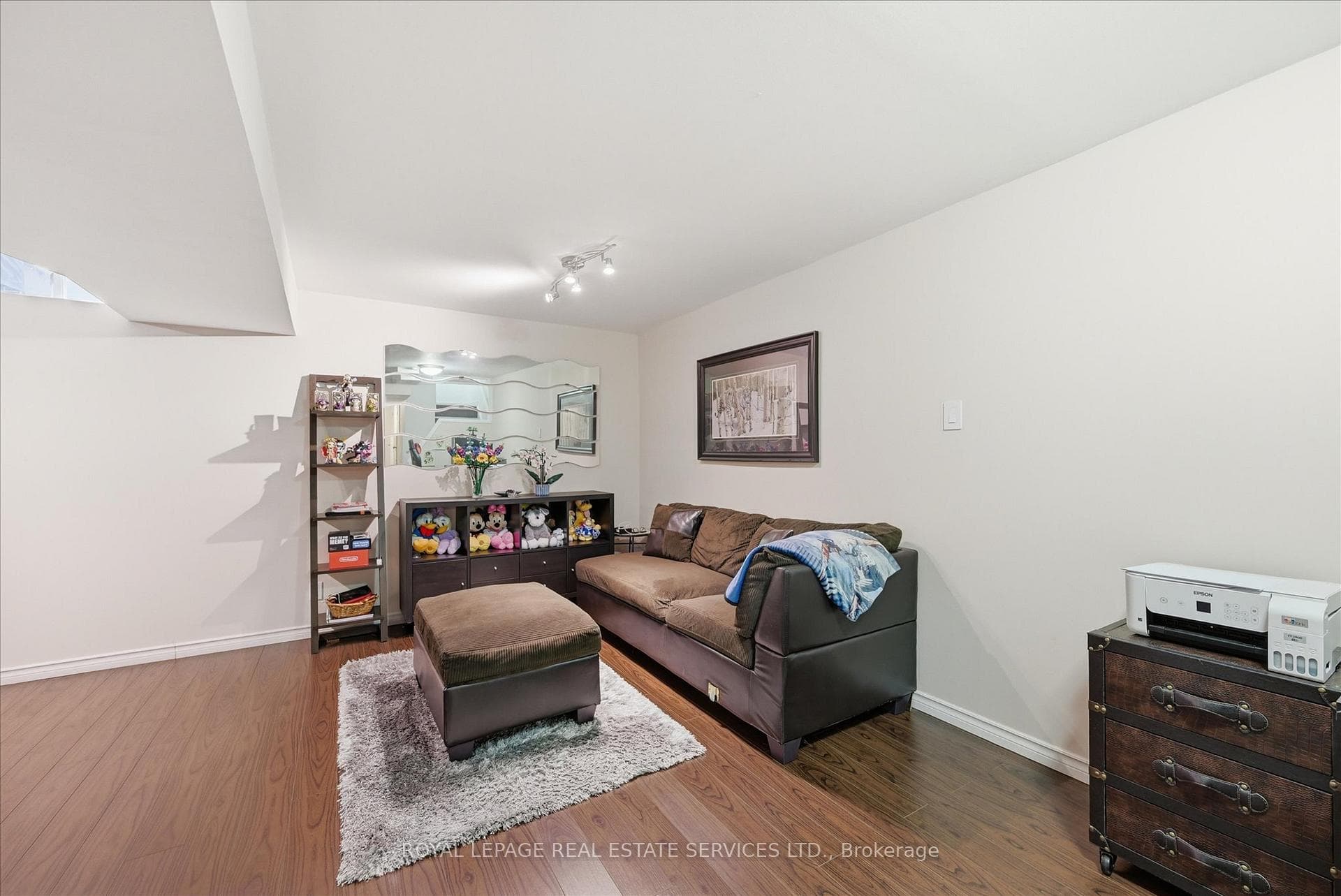Finished Basement Complete with Laminate Flooring