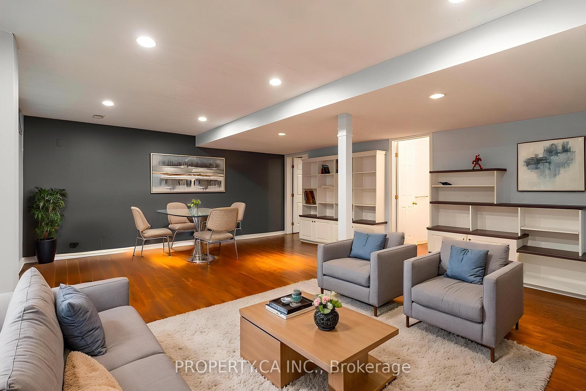 Basement lounge with built-ins (virtually staged)