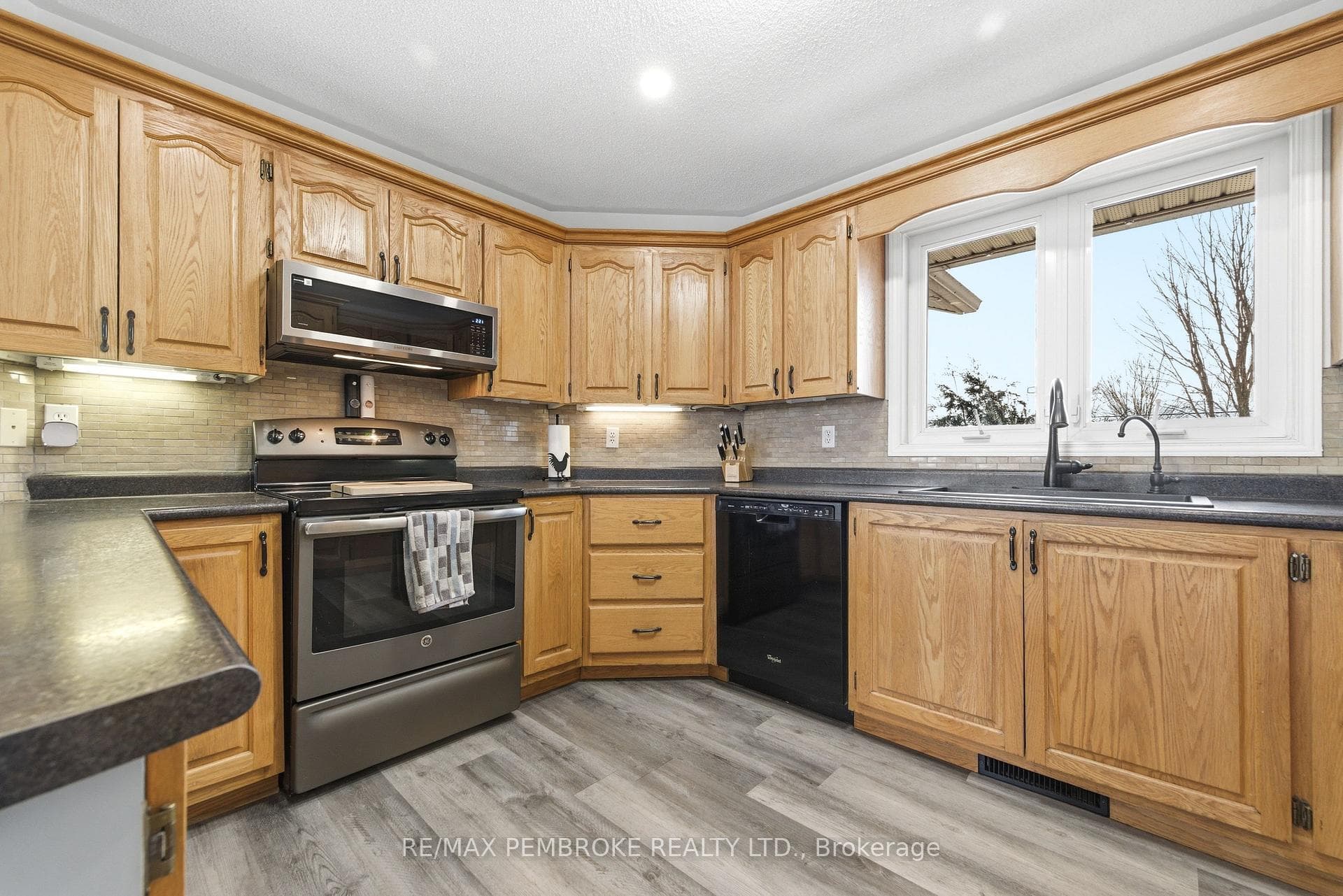 Ample cabinetry, new microwave hood fan