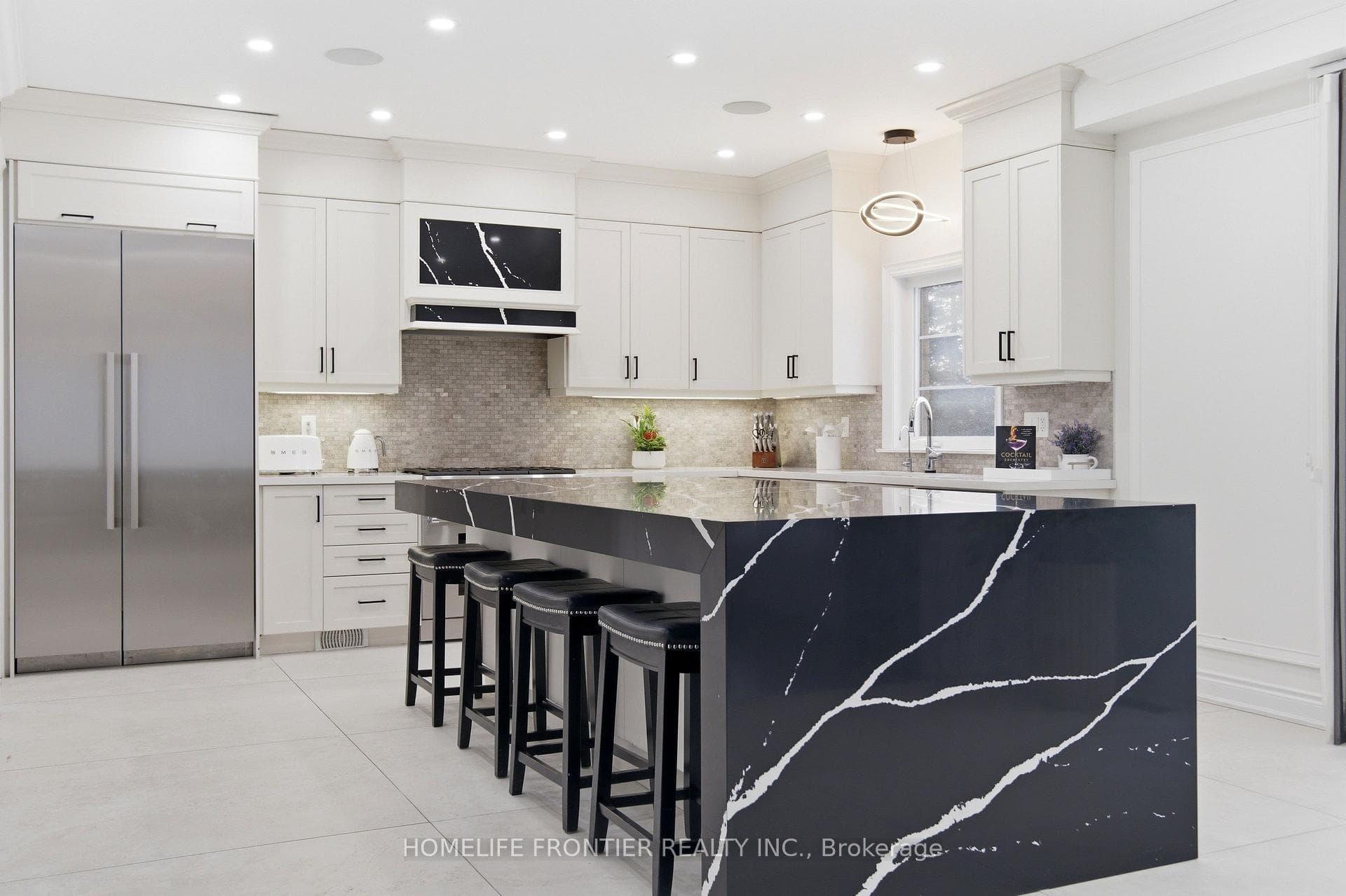Custom Kitchen With Waterfall Breakfast Bar