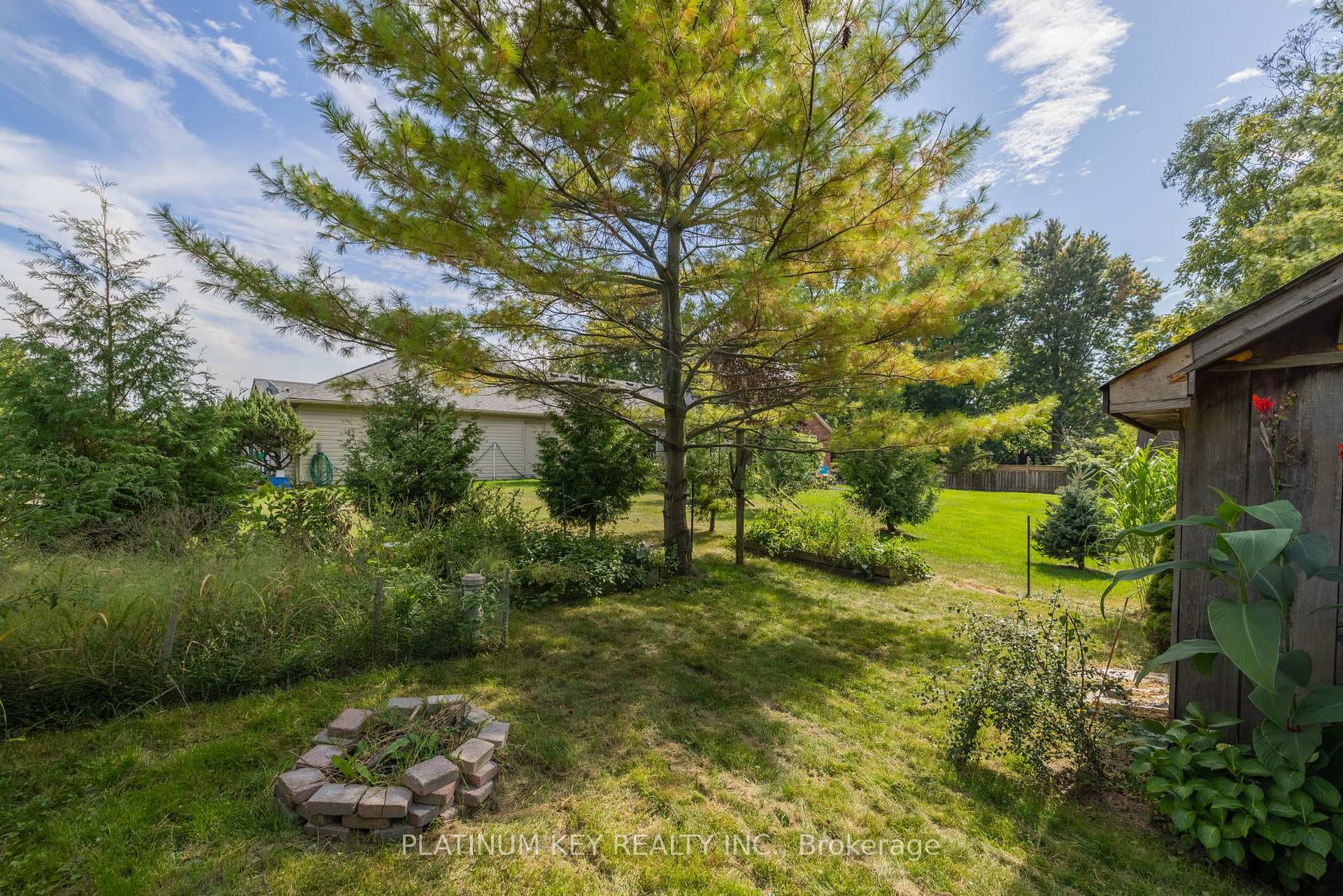 701 Regent - partially fenced back yard