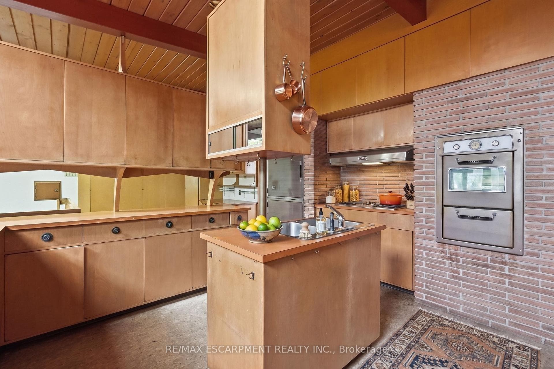 Virtually Staged -Kit. featuring wood cabinetry