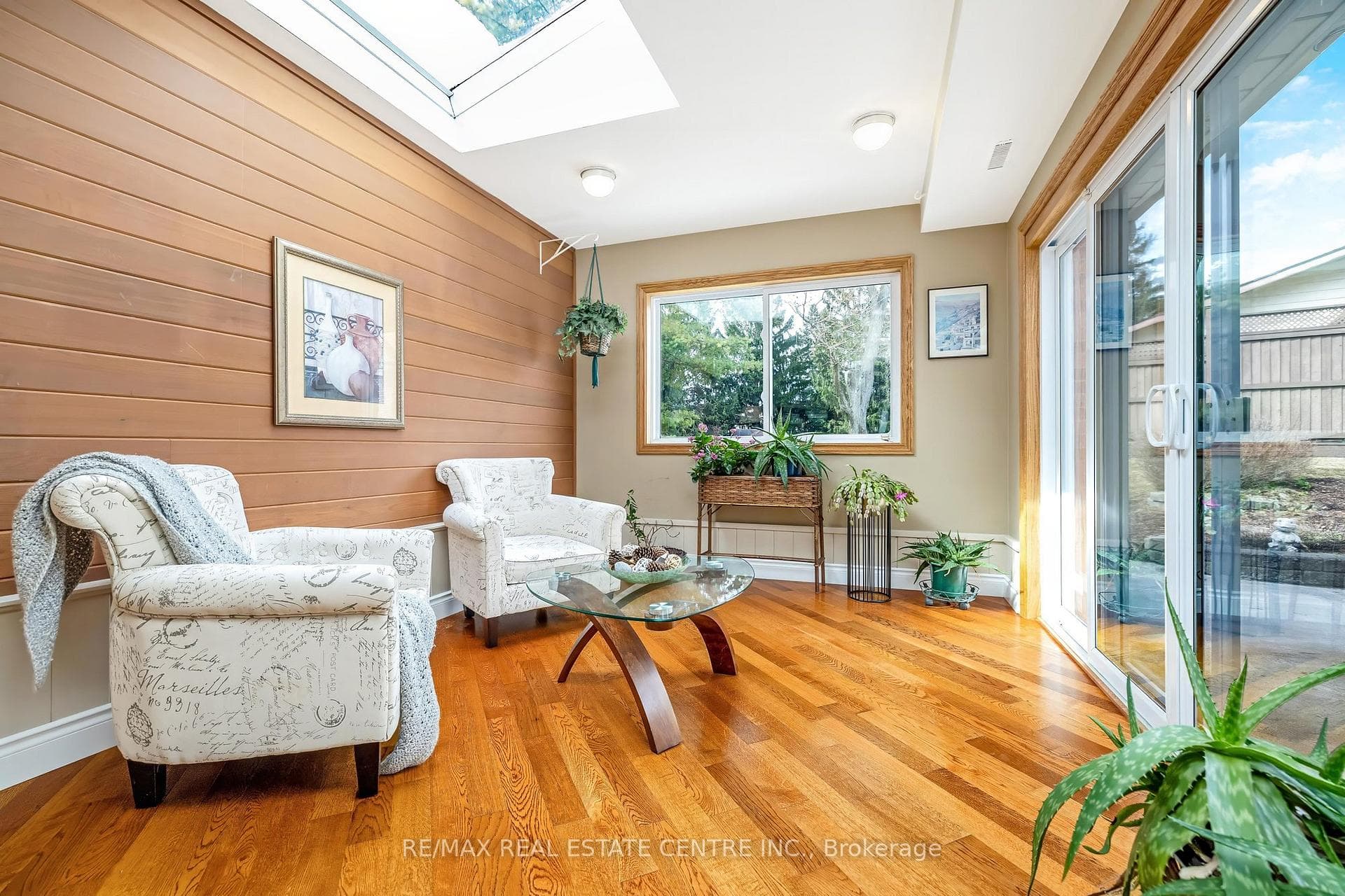 4 season sun room with walkout to patio