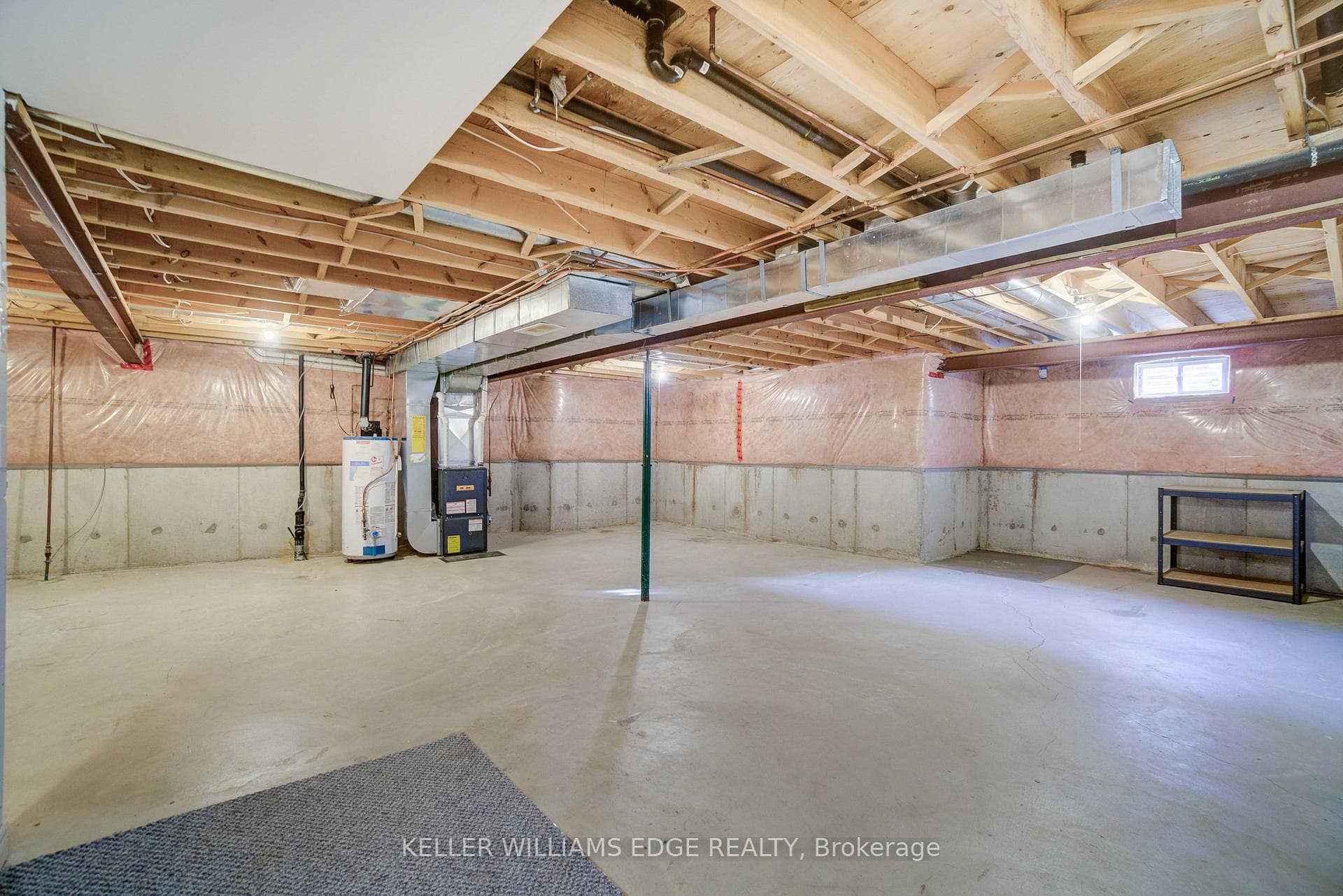 Basement with heating unit and water heater